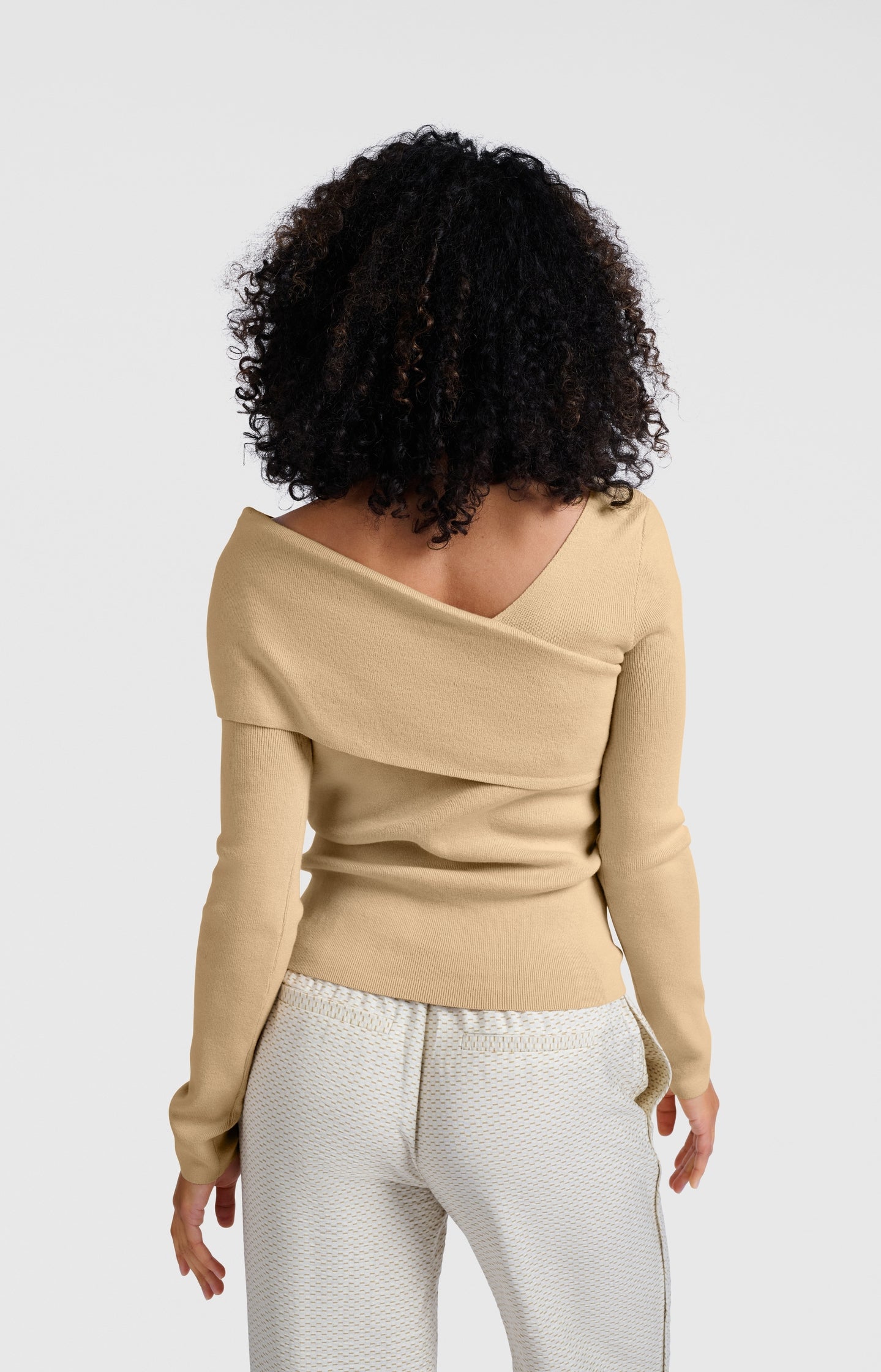 Top with wrap-over neckline