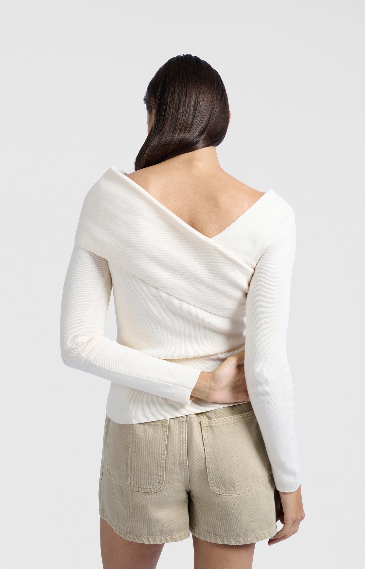 Top with wrap-over neckline