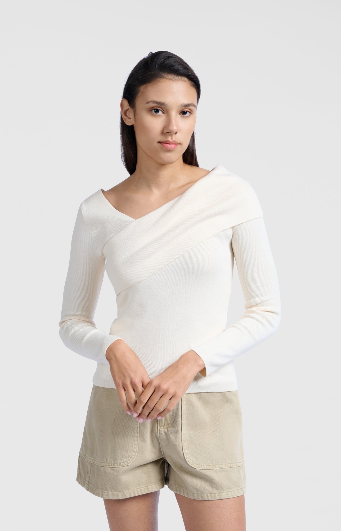 Top with wrap-over neckline