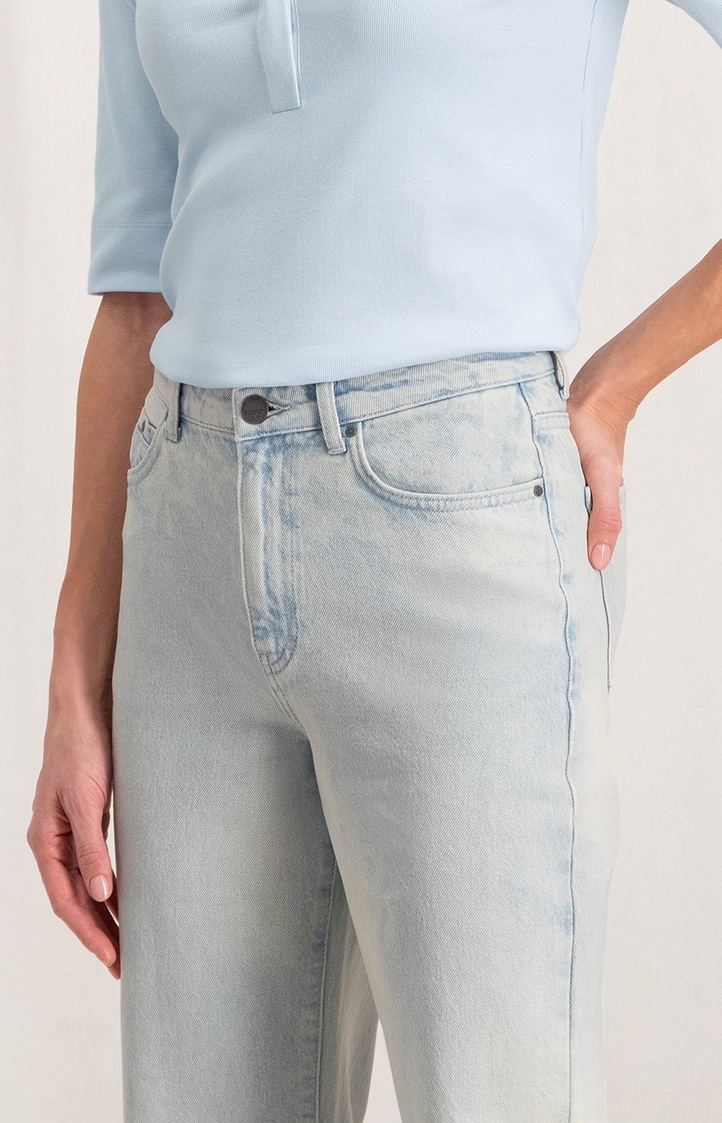 Wide leg denim with pockets, zip fly and washed effect