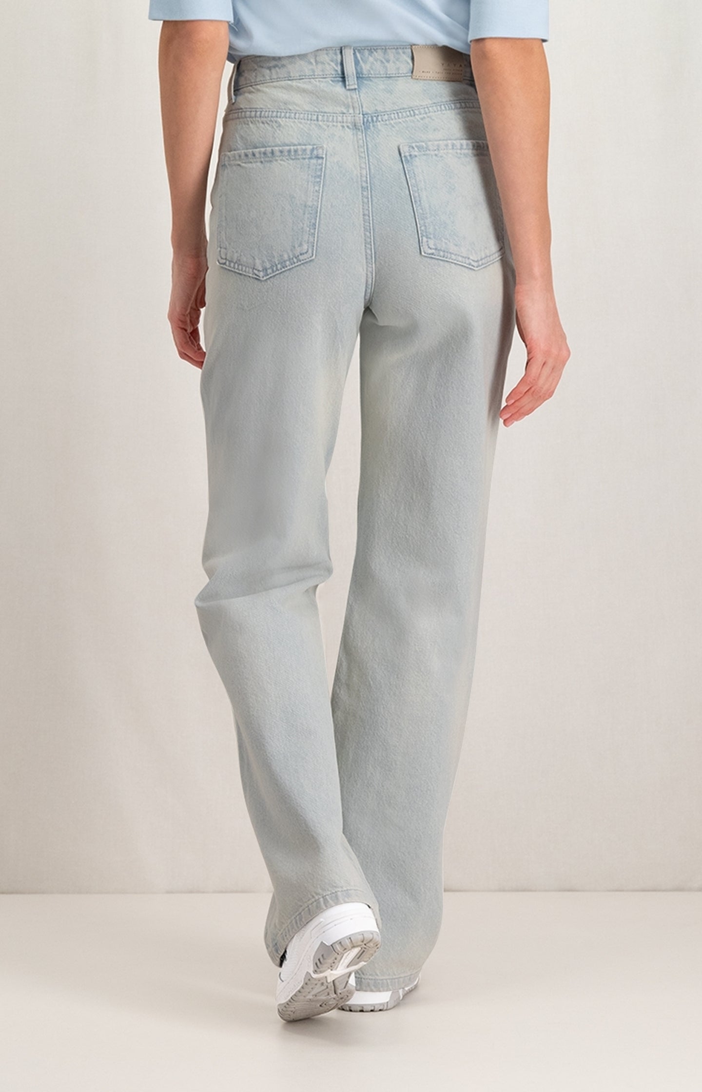 Wide leg denim with pockets, zip fly and washed effect