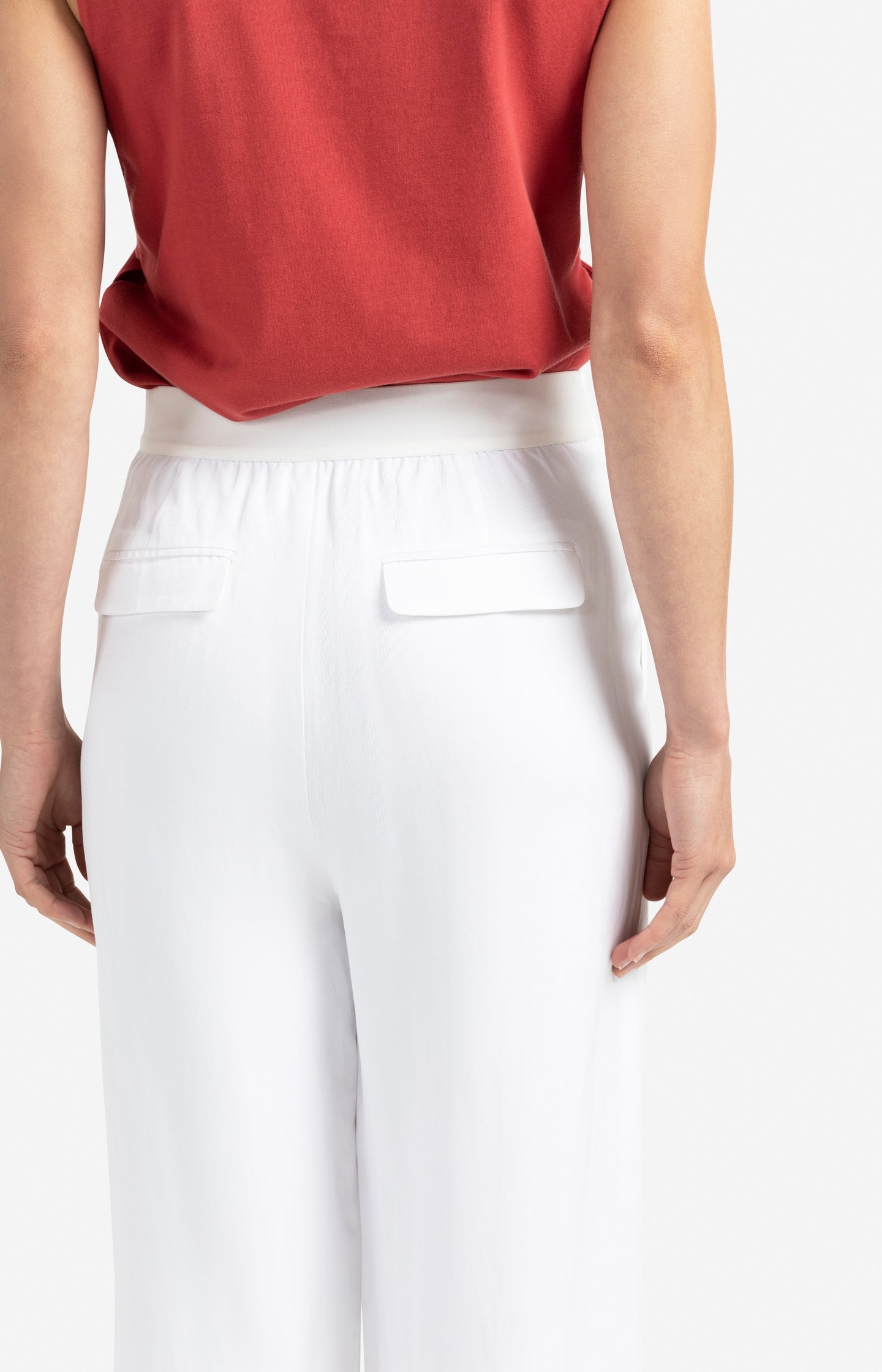 Woven high-waist trousers with wide legs and seam details