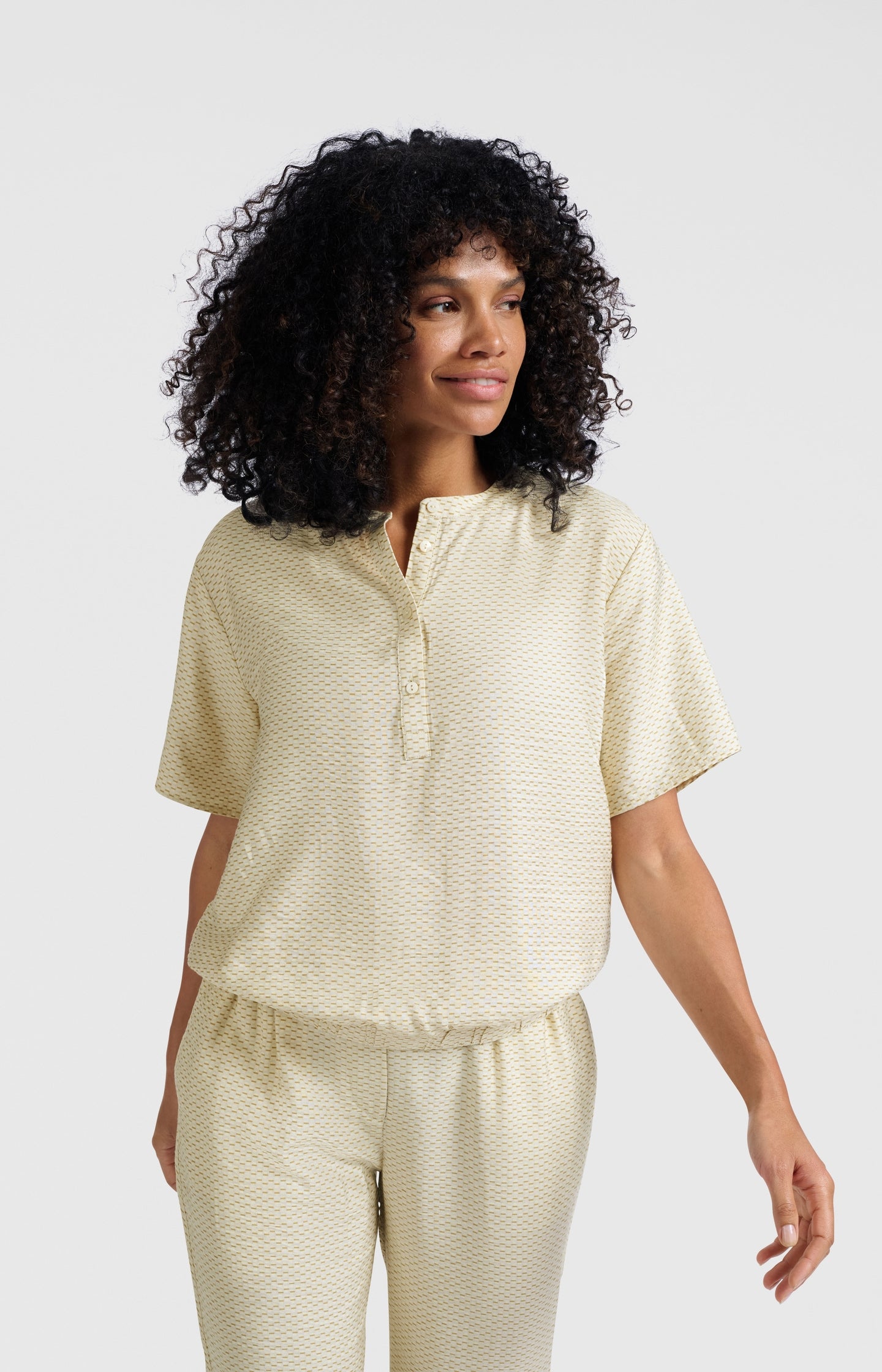 Woven polo blouse with subtle print