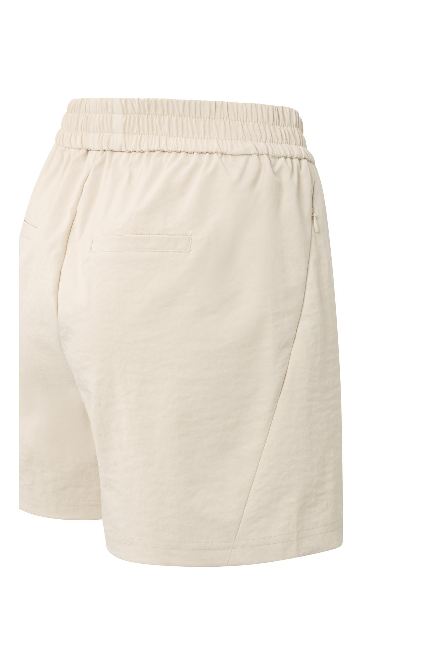 Woven shorts with elastic waistband and zipper pockets