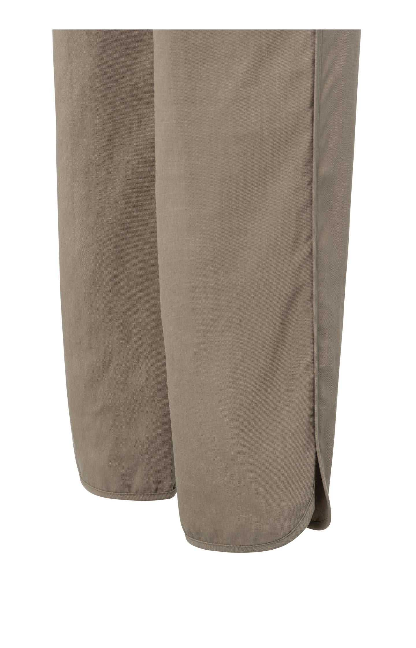 Woven trousers with elastic waistband and curved hem
