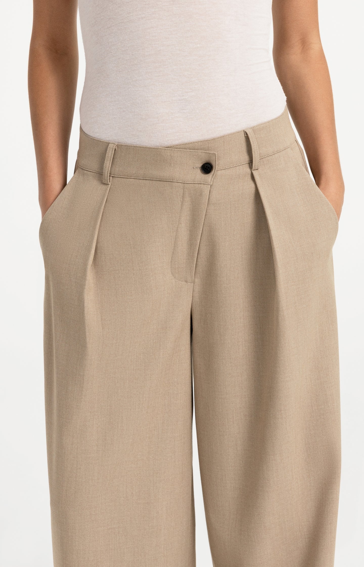 Woven trousers with wide legs and asymmetrical closure
