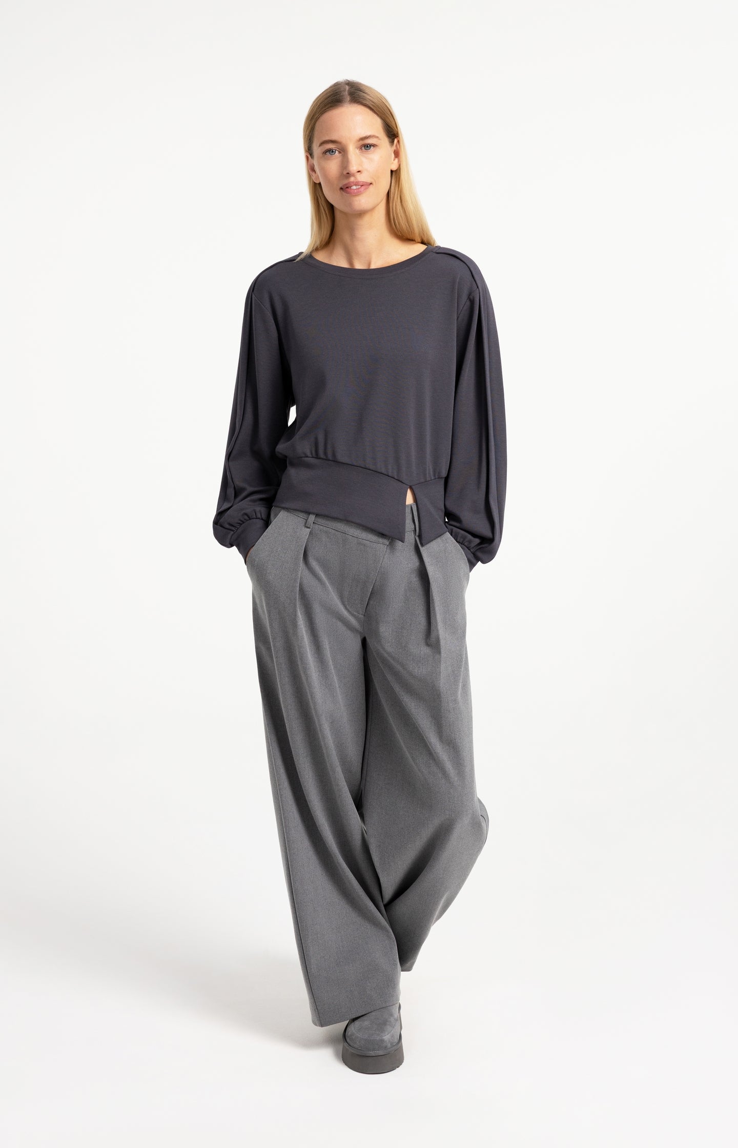 Woven trousers with wide legs and asymmetrical closure