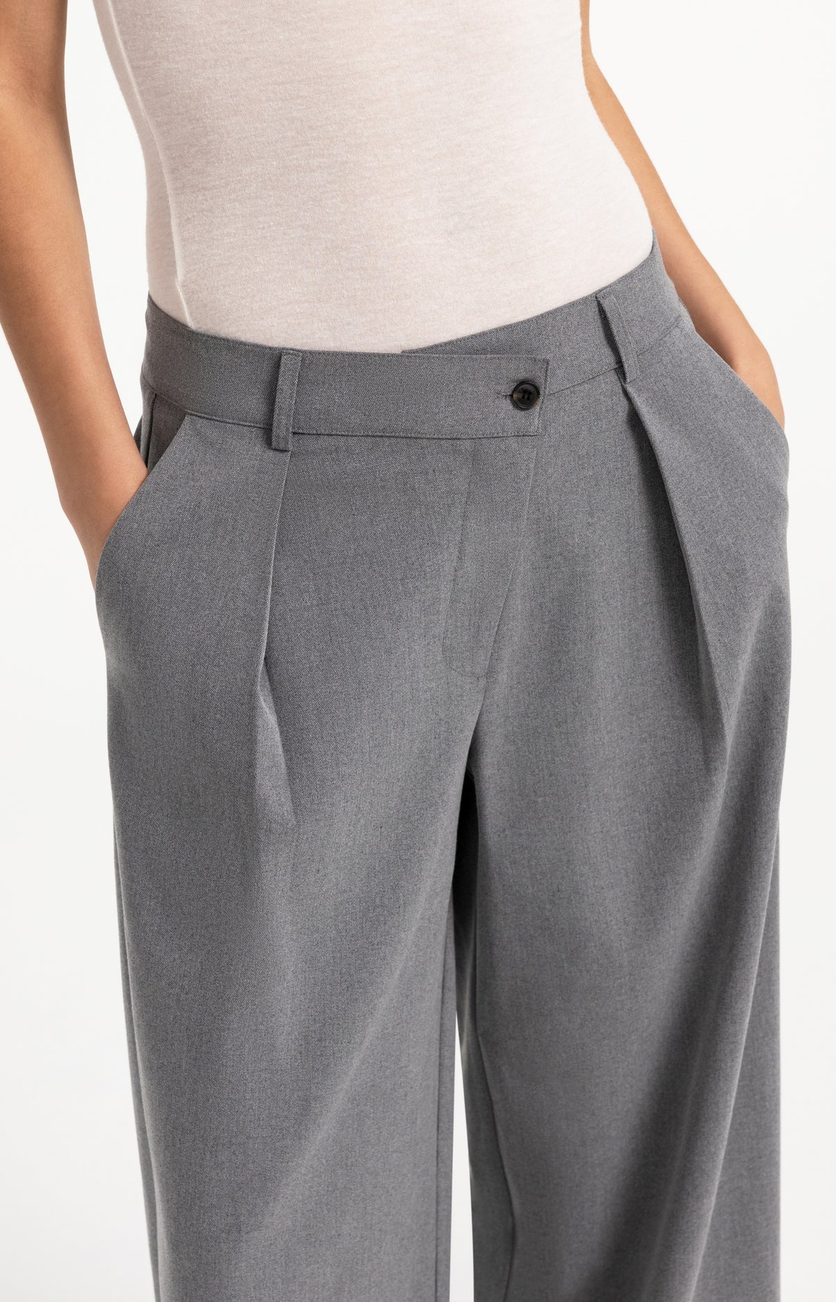 Woven trousers with wide legs and asymmetrical closure