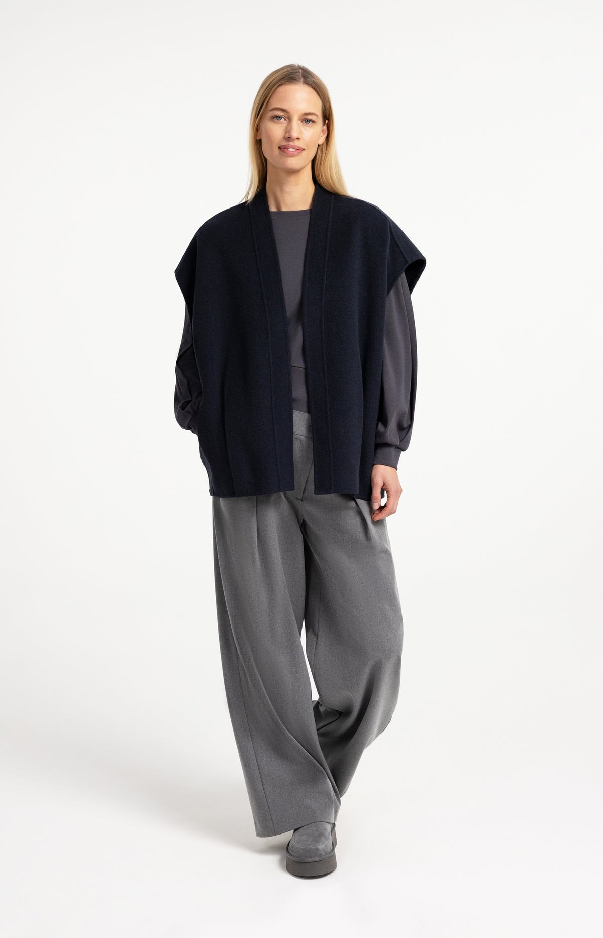 Woven trousers with wide legs and asymmetrical closure
