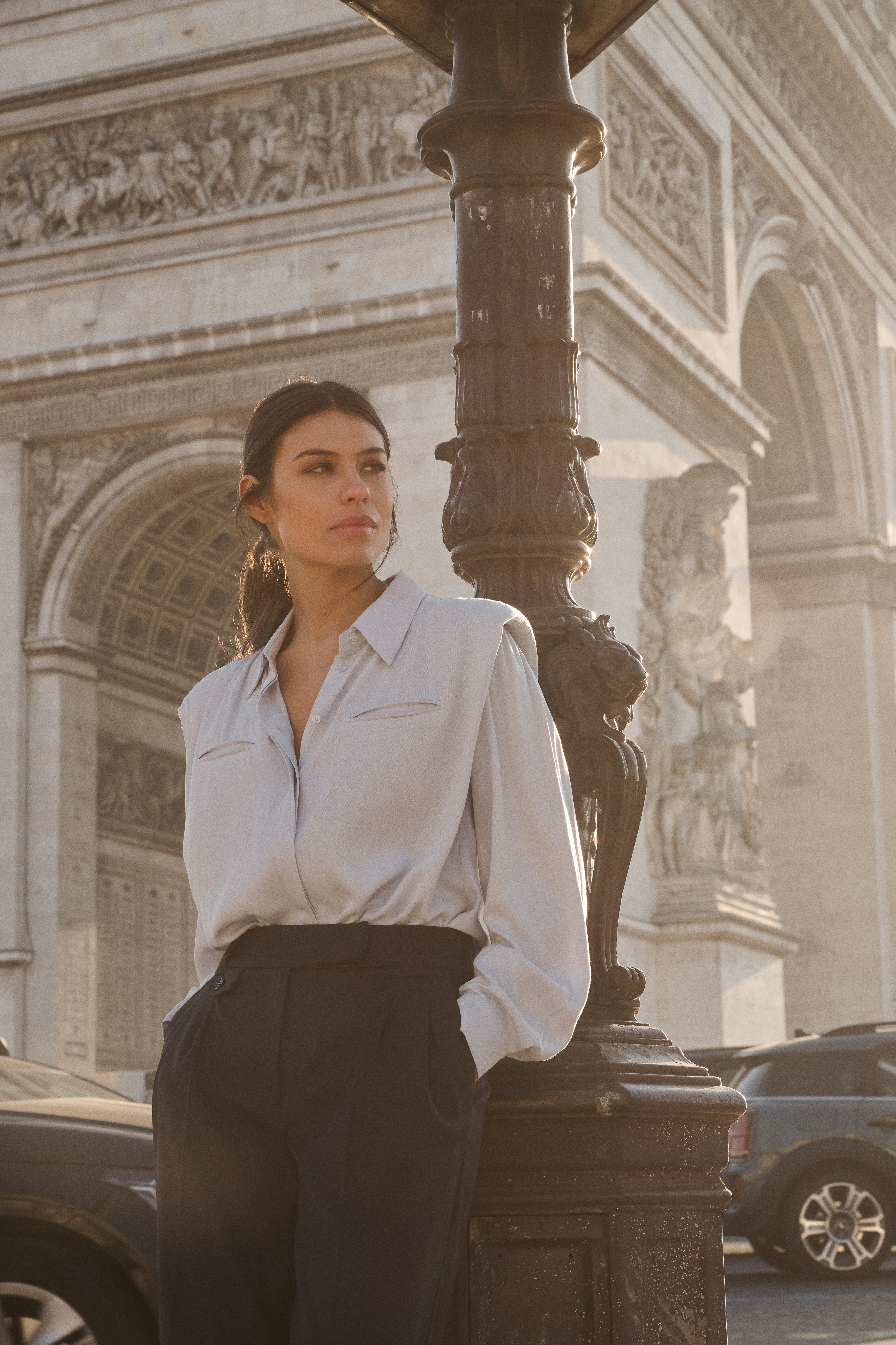 Blouse with long sleeves, buttons and shoulder pads