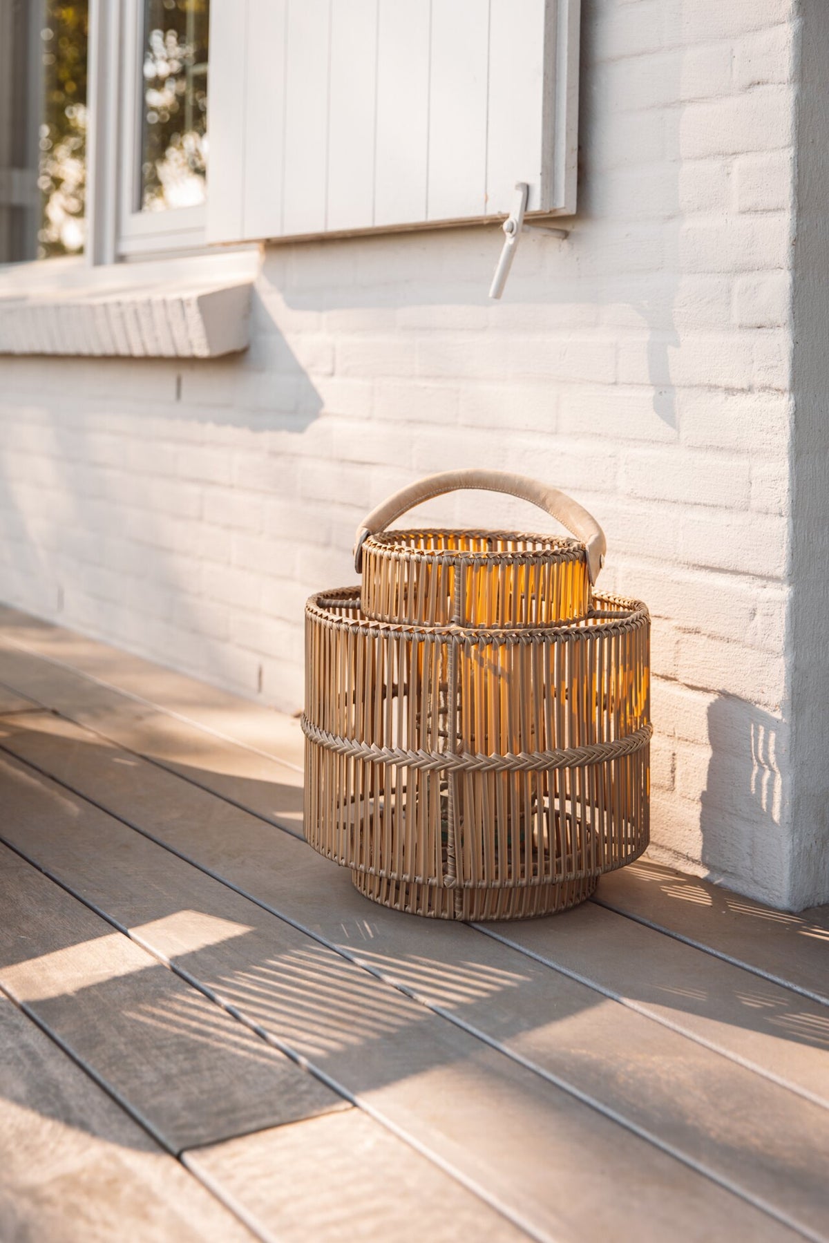 Outdoor lantern with candle holder