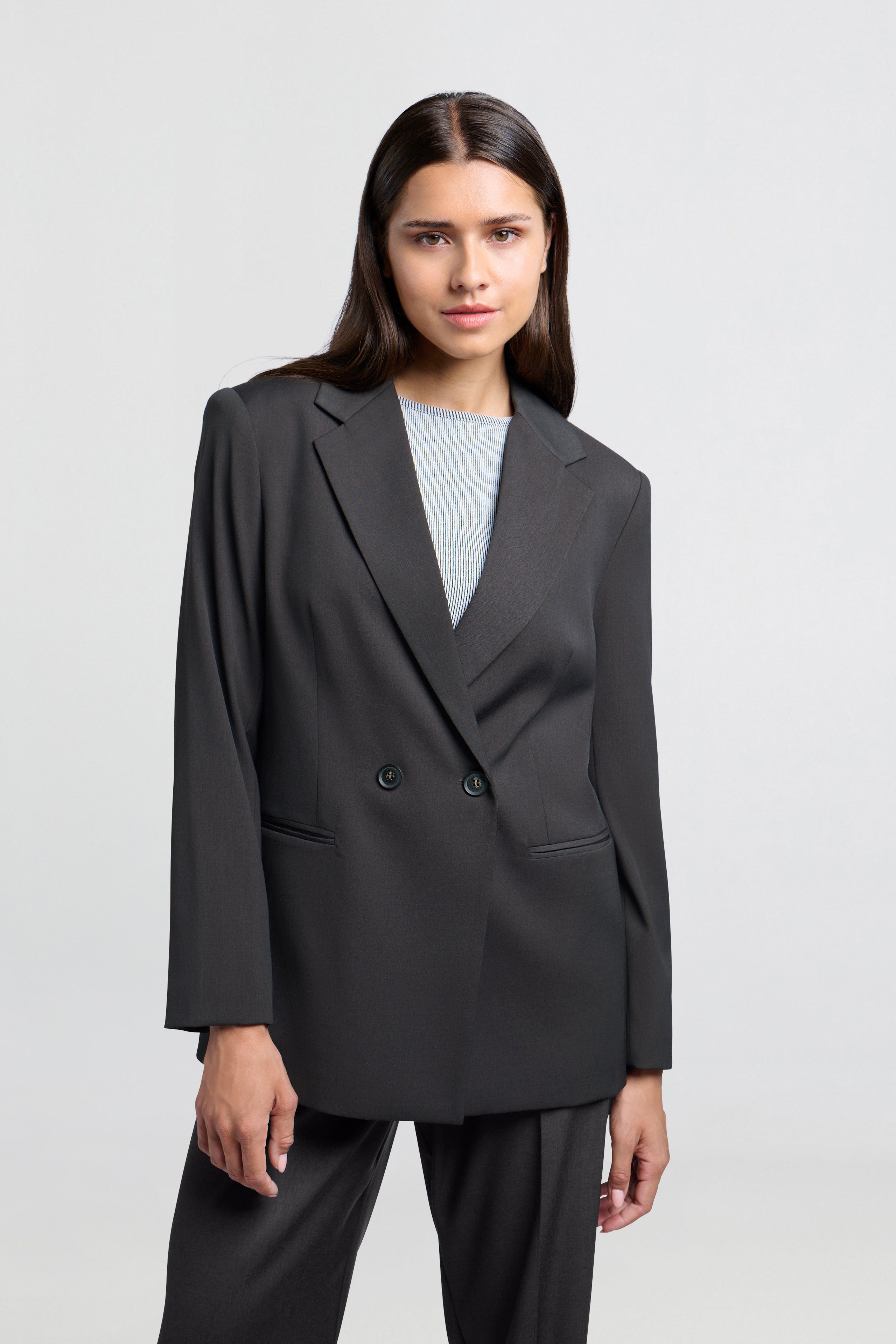 Blazer with double-breasted button closure