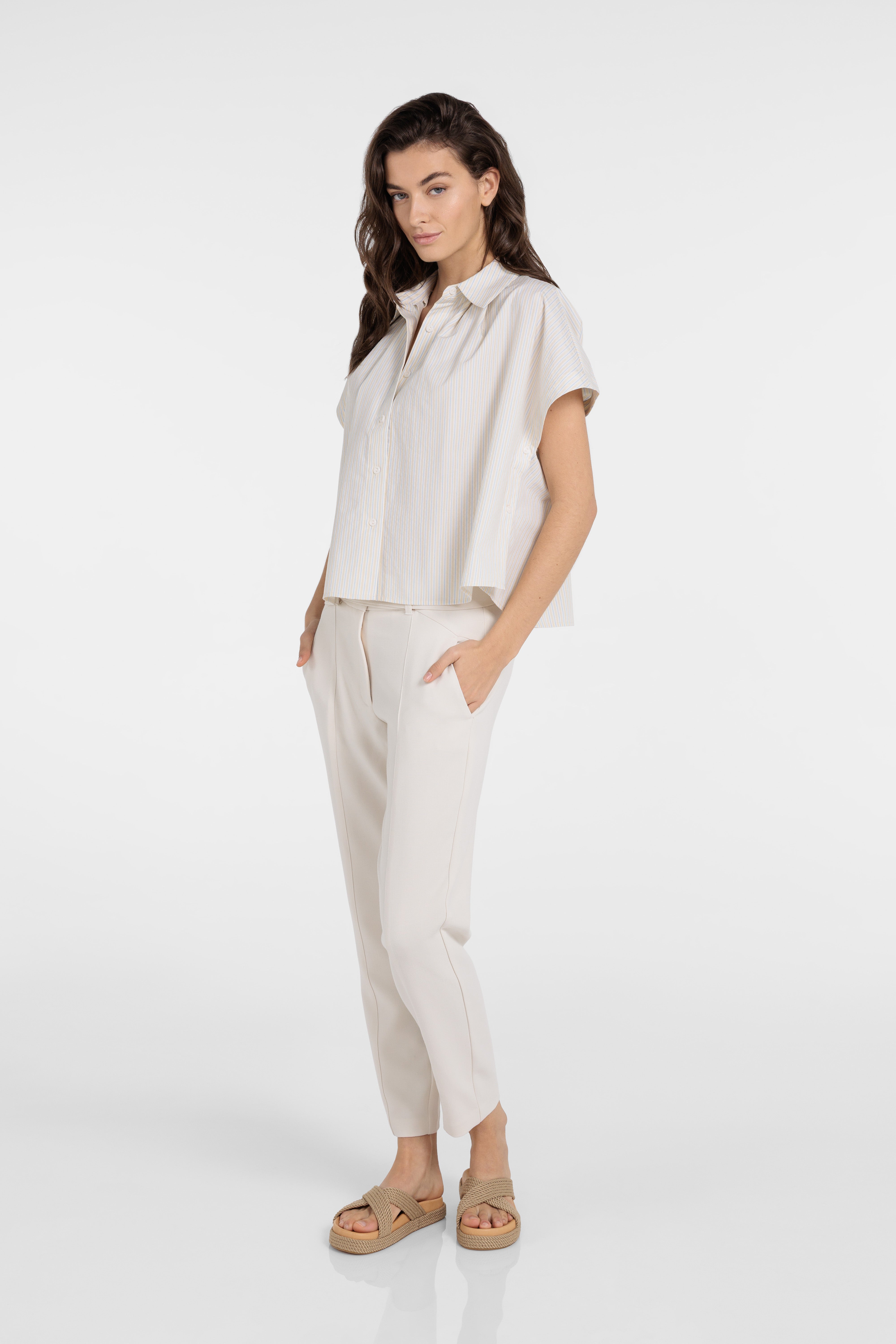 Sleeveless striped blouse with button detail