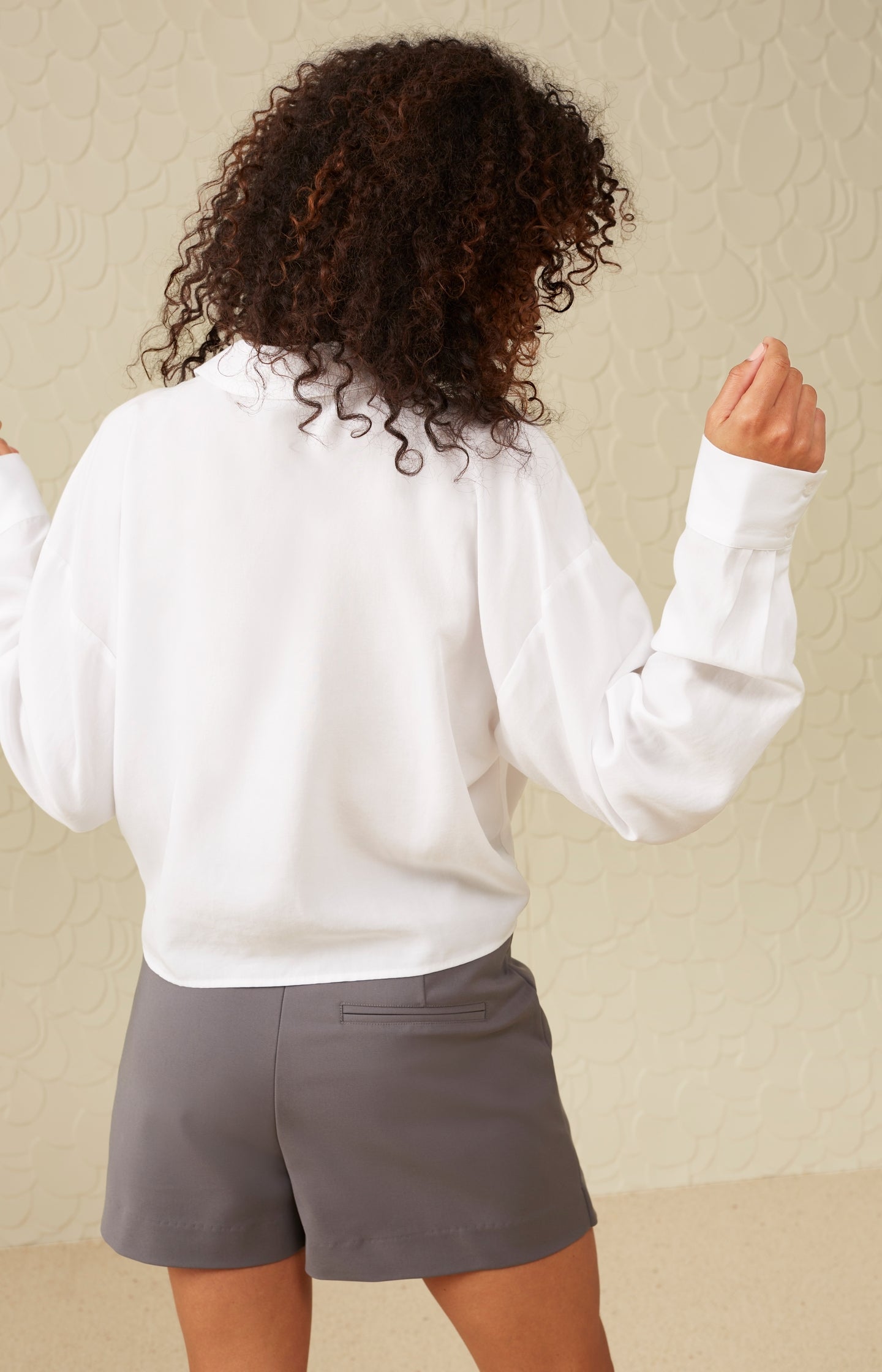 Asymmetrical blouse with V-neck, long sleeves and buttons