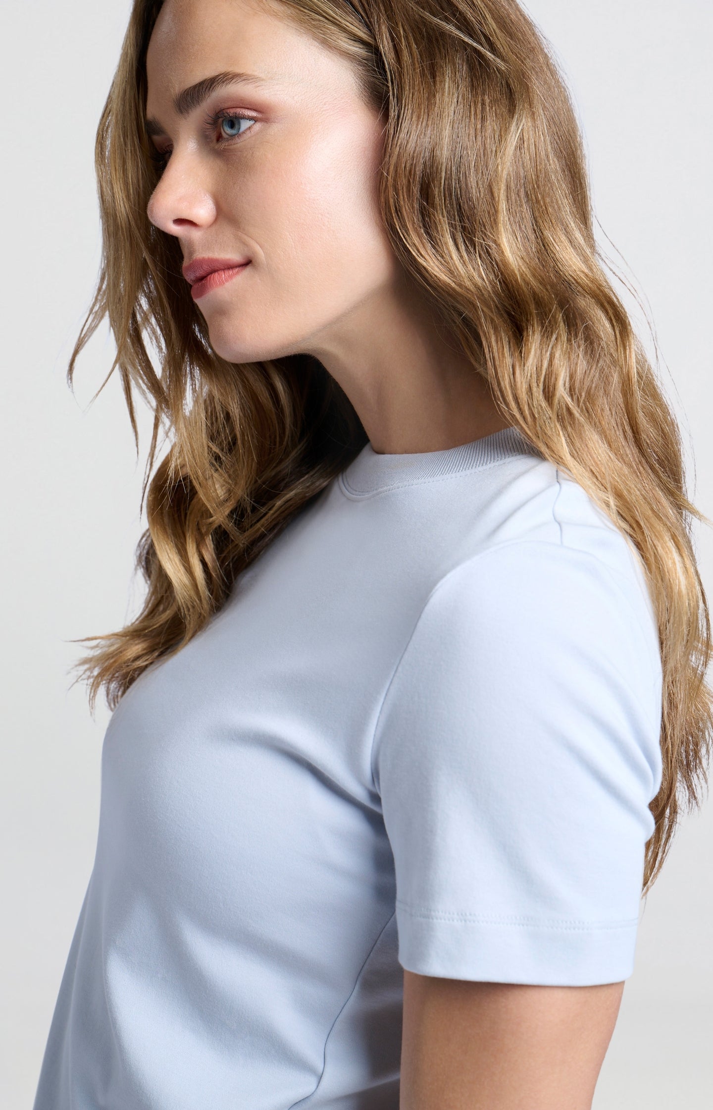 Basic light blue T-shirt with short sleeves and a round neck