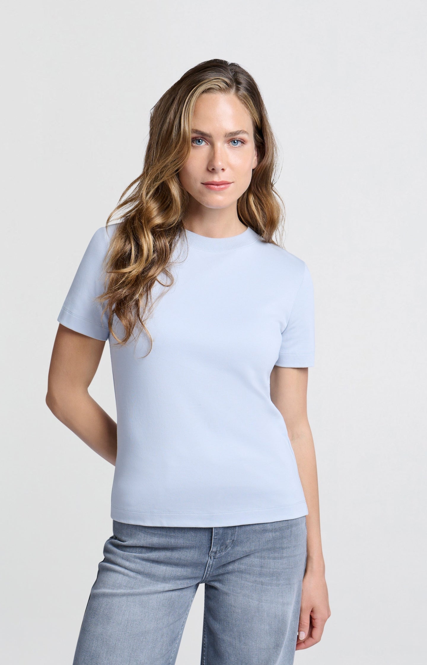 Basic light blue T-shirt with short sleeves and a round neck