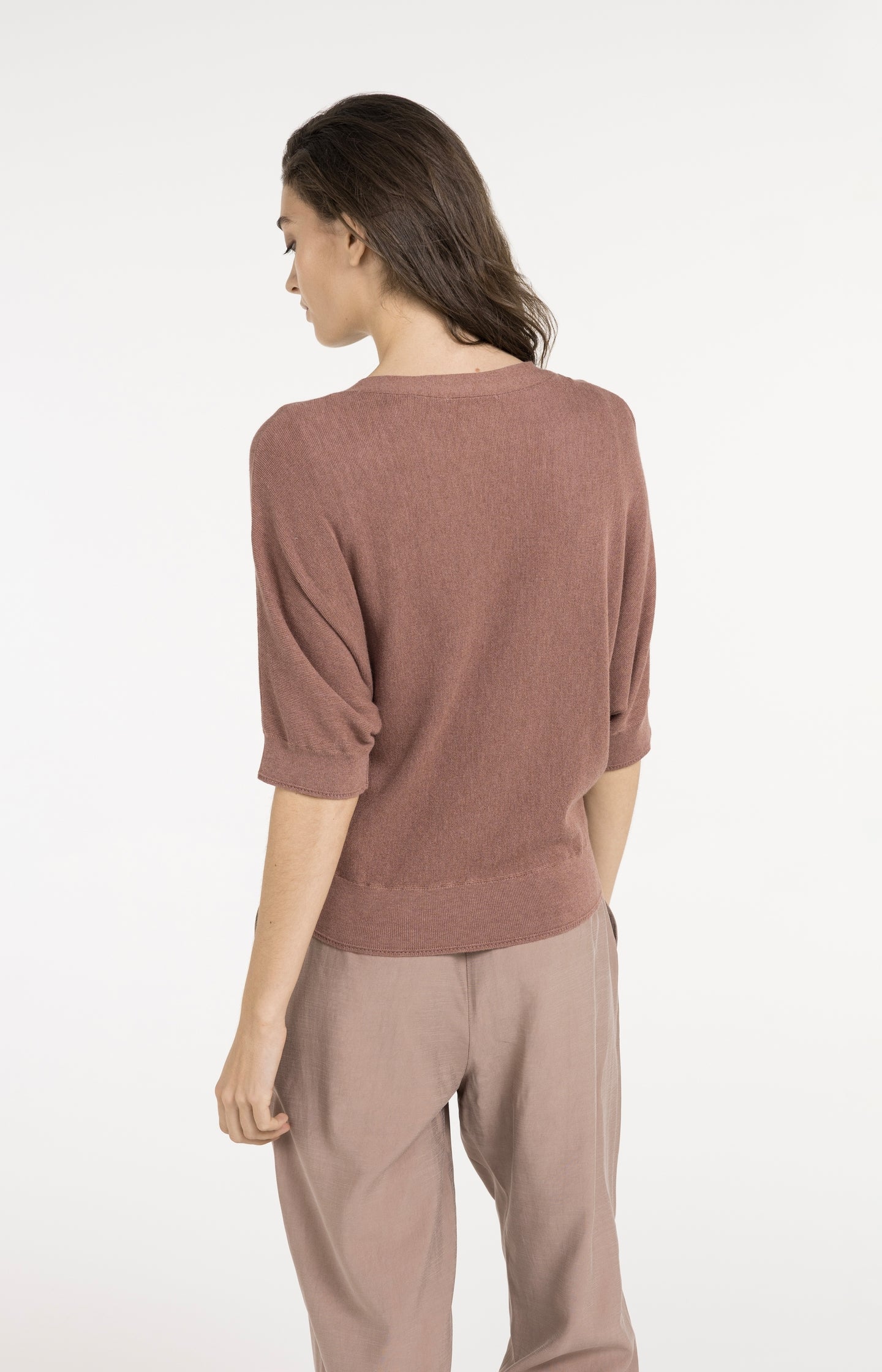 Batwing cardigan with short sleeves and button closure
