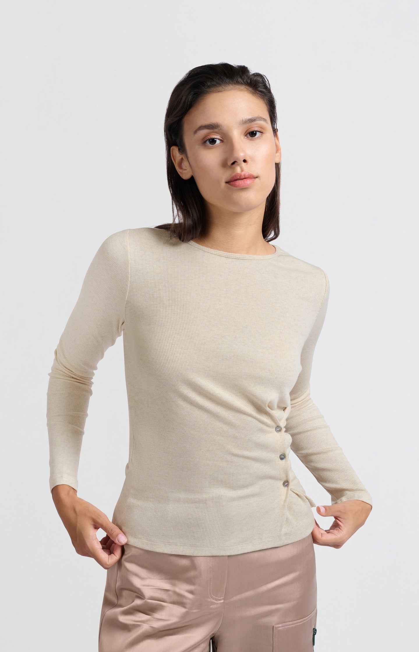 Beige top with long sleeves and asymmetrical button details - Type: lookbook