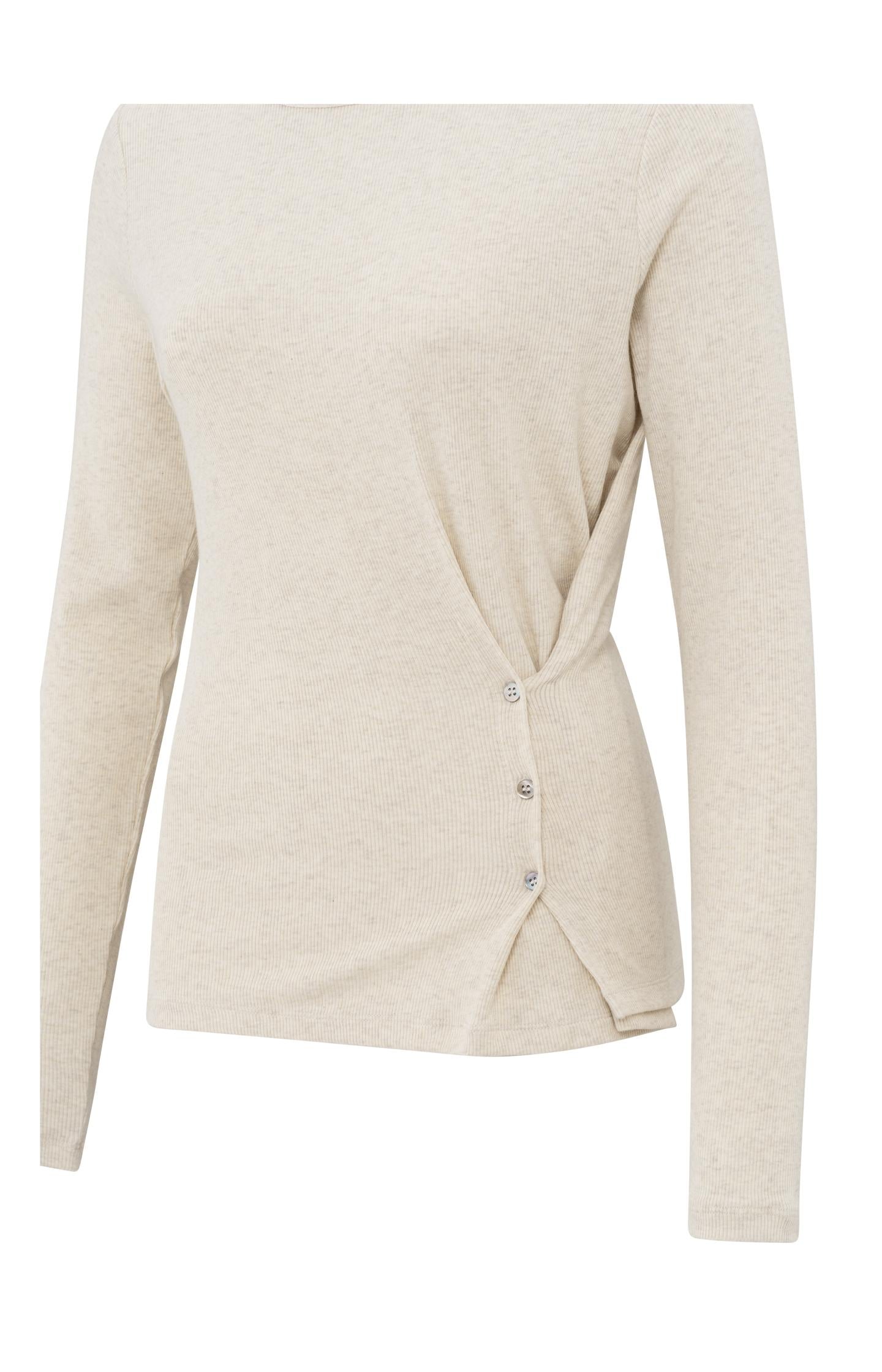 Beige top with long sleeves and asymmetrical button details