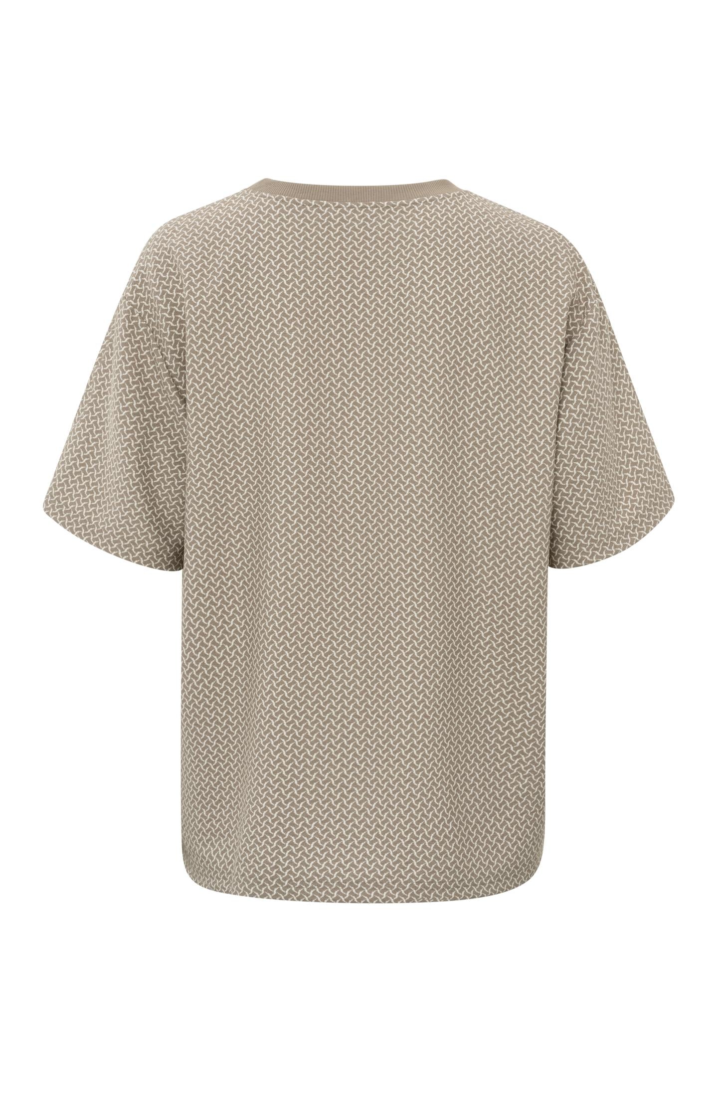 Beige top with short sleeves, round neck and printed pattern