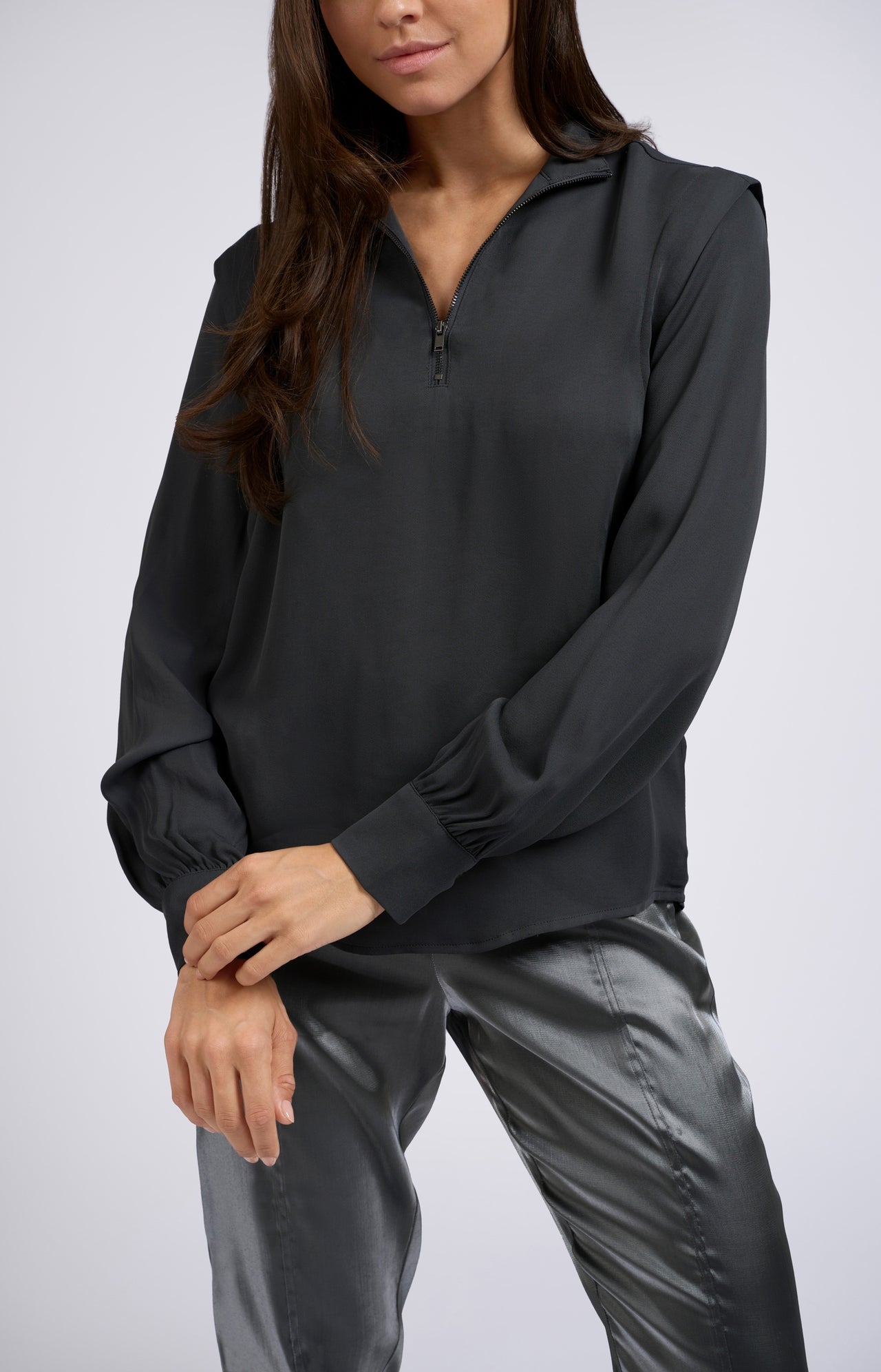 Black blouse with long sleeves, pleats and high turtleneck