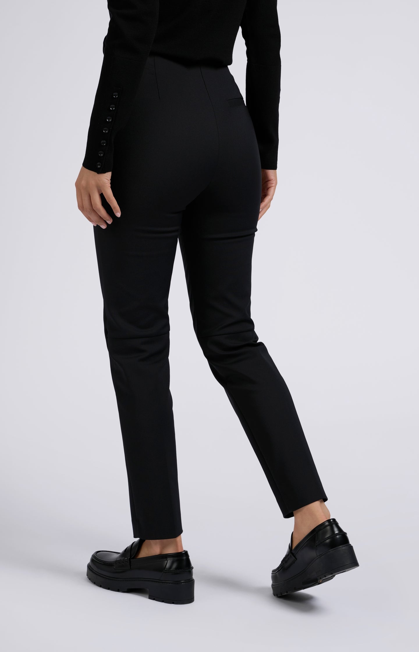 Black pants with high waist and straight legs