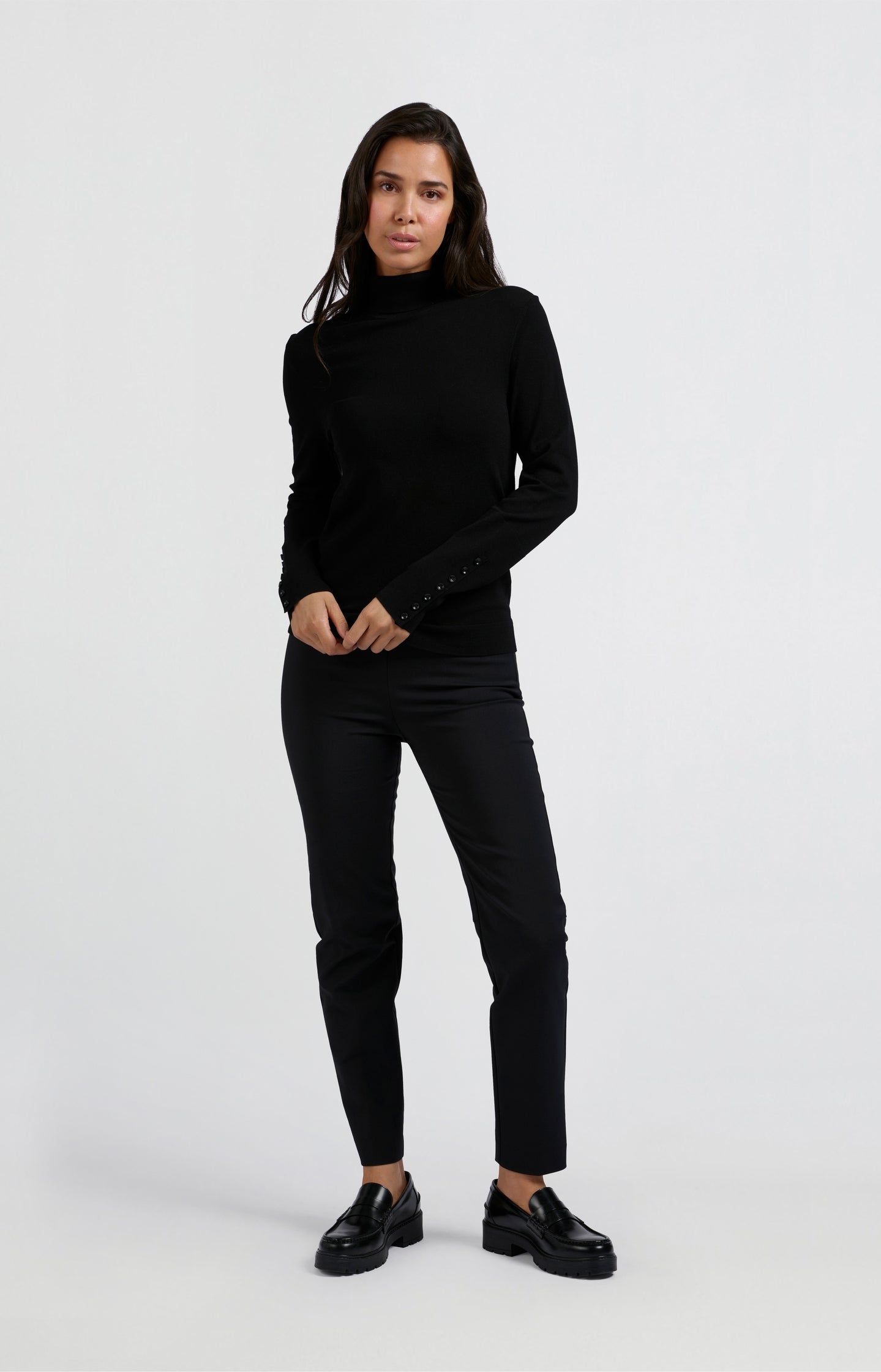 Black pants with high waist and straight legs