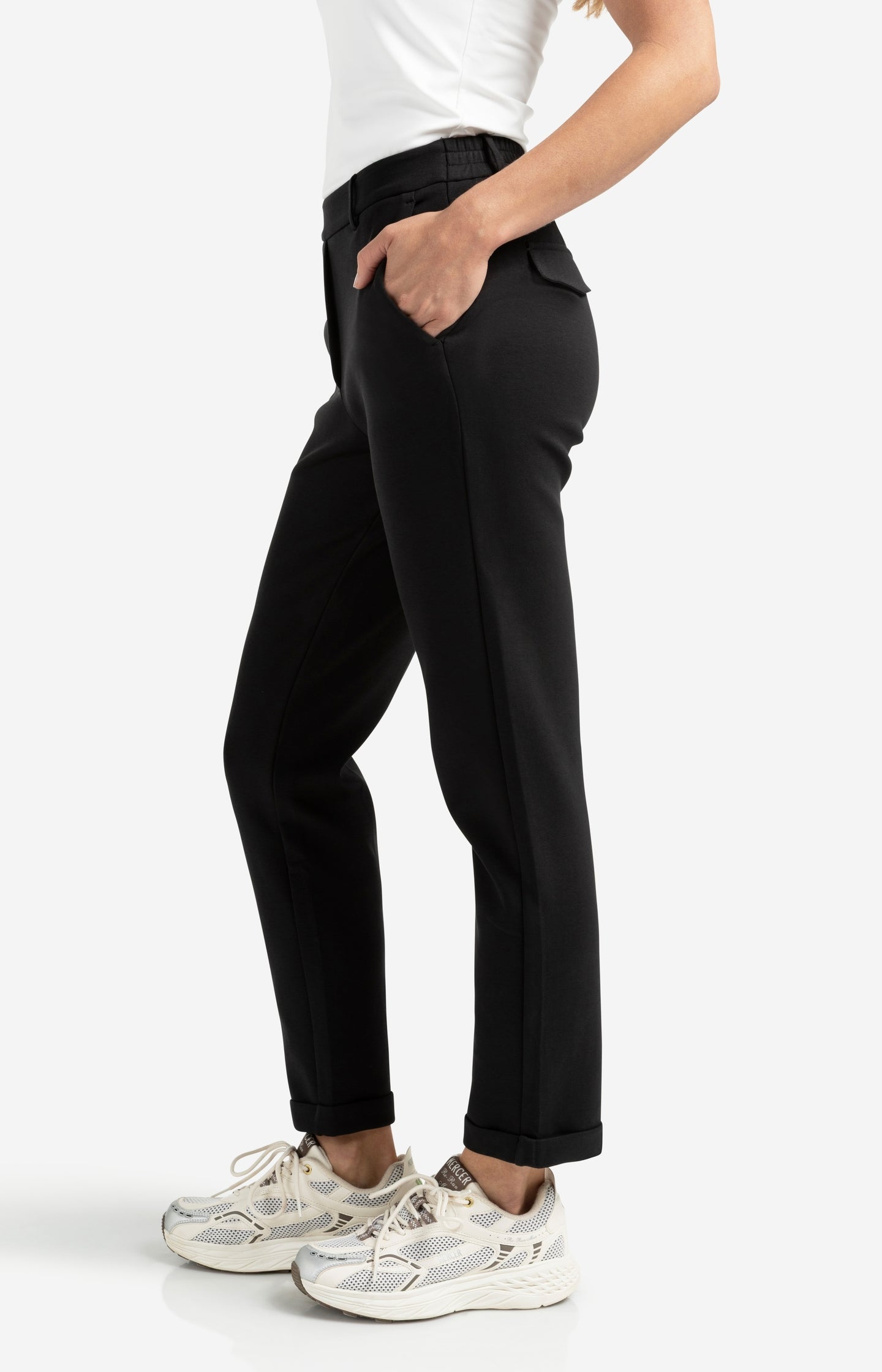 Black scuba trousers with straight legs and flap pockets