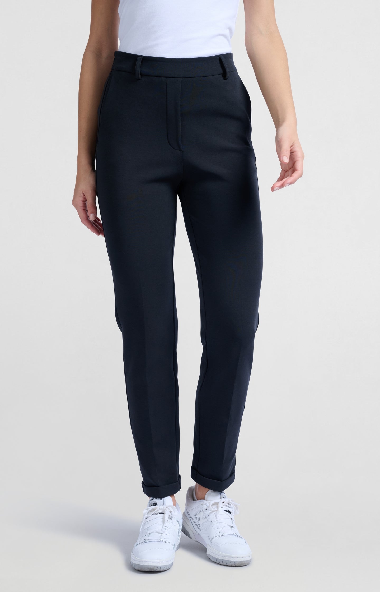 Black scuba trousers with straight legs and flap pockets