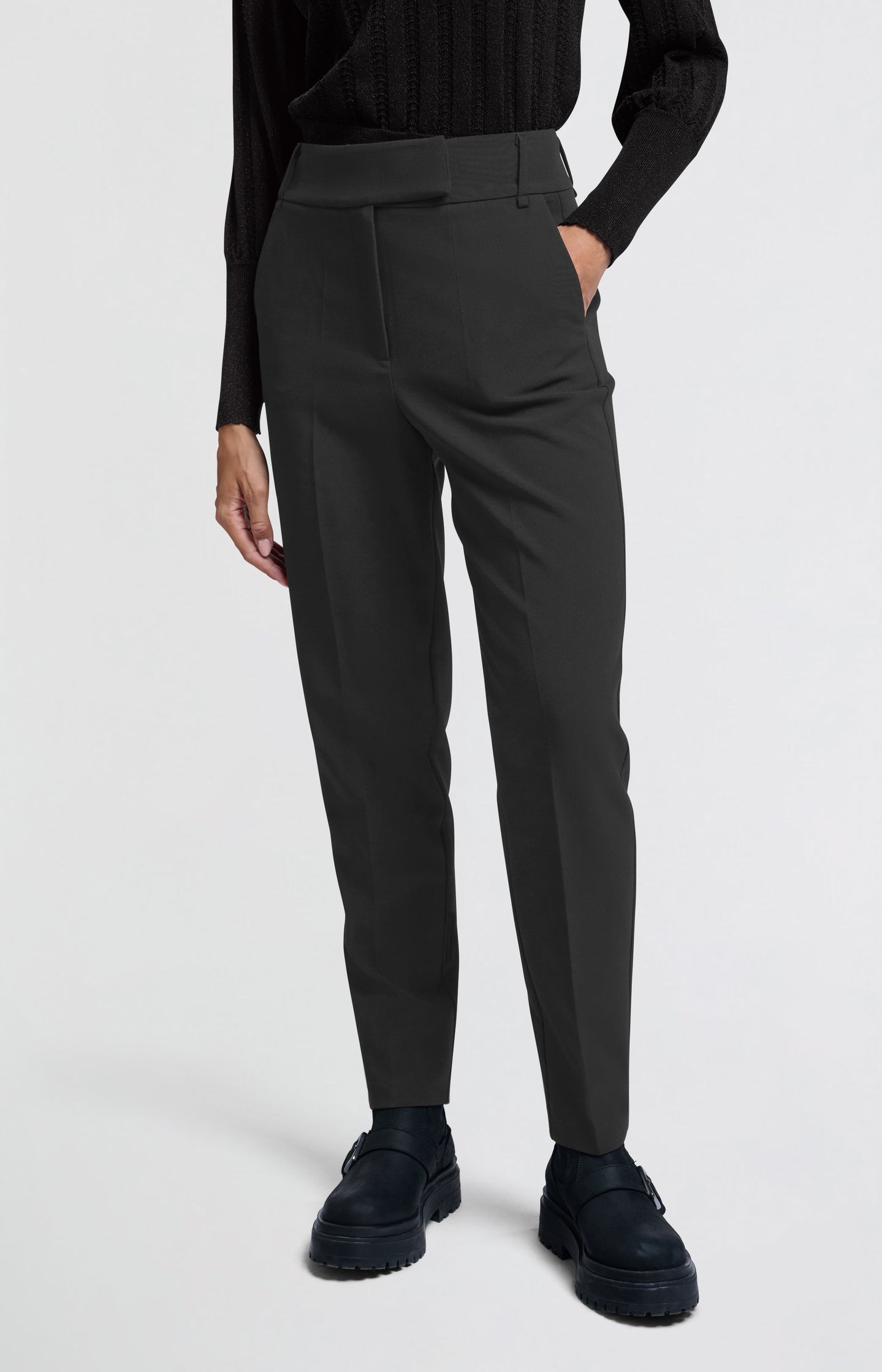 Black trousers with high waist and straight legs