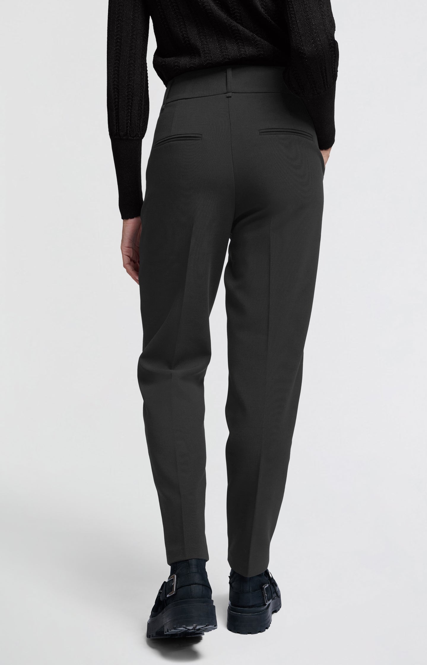 Black trousers with high waist and straight legs