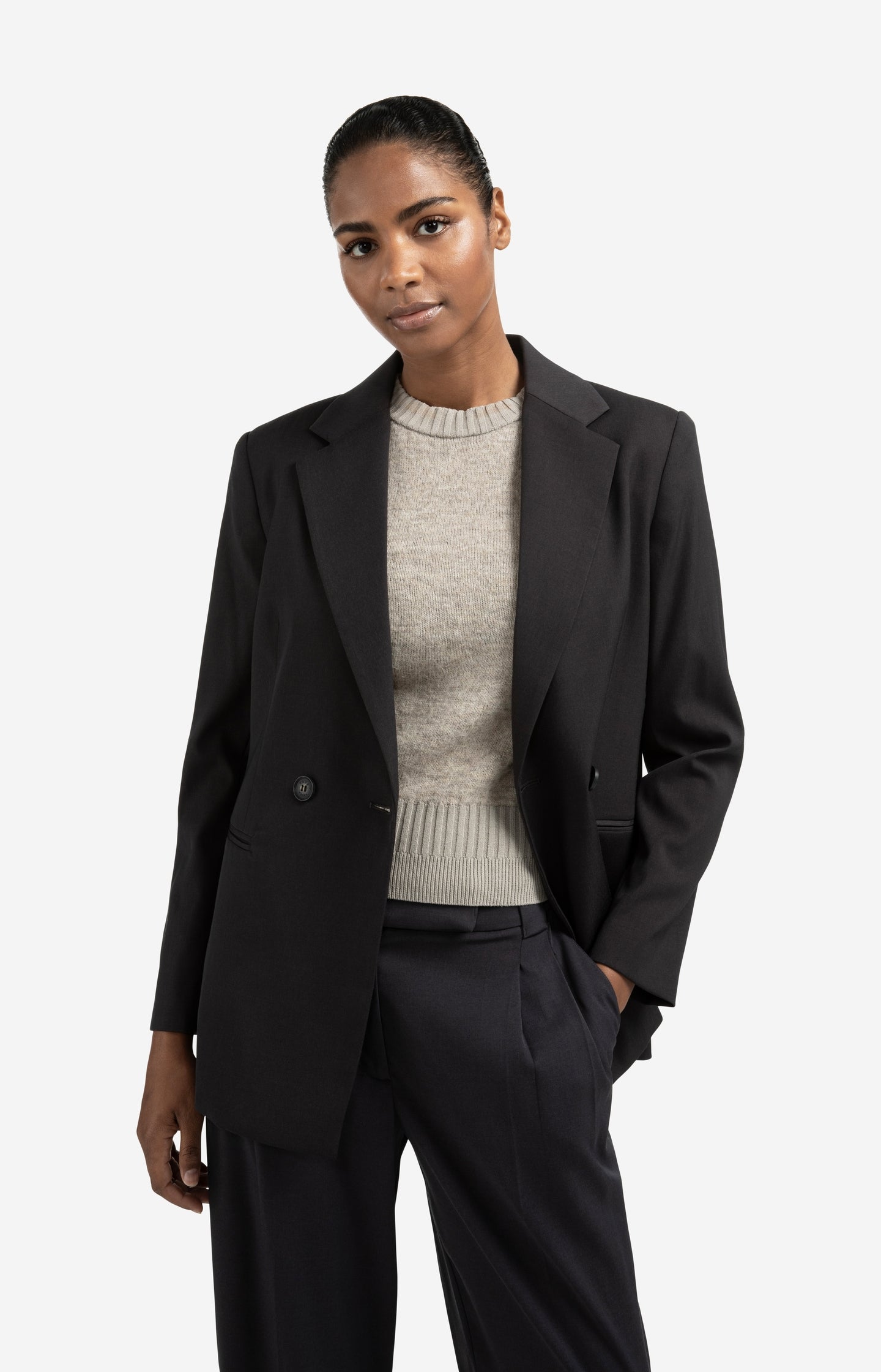 Blazer with belt and double-breasted closure
