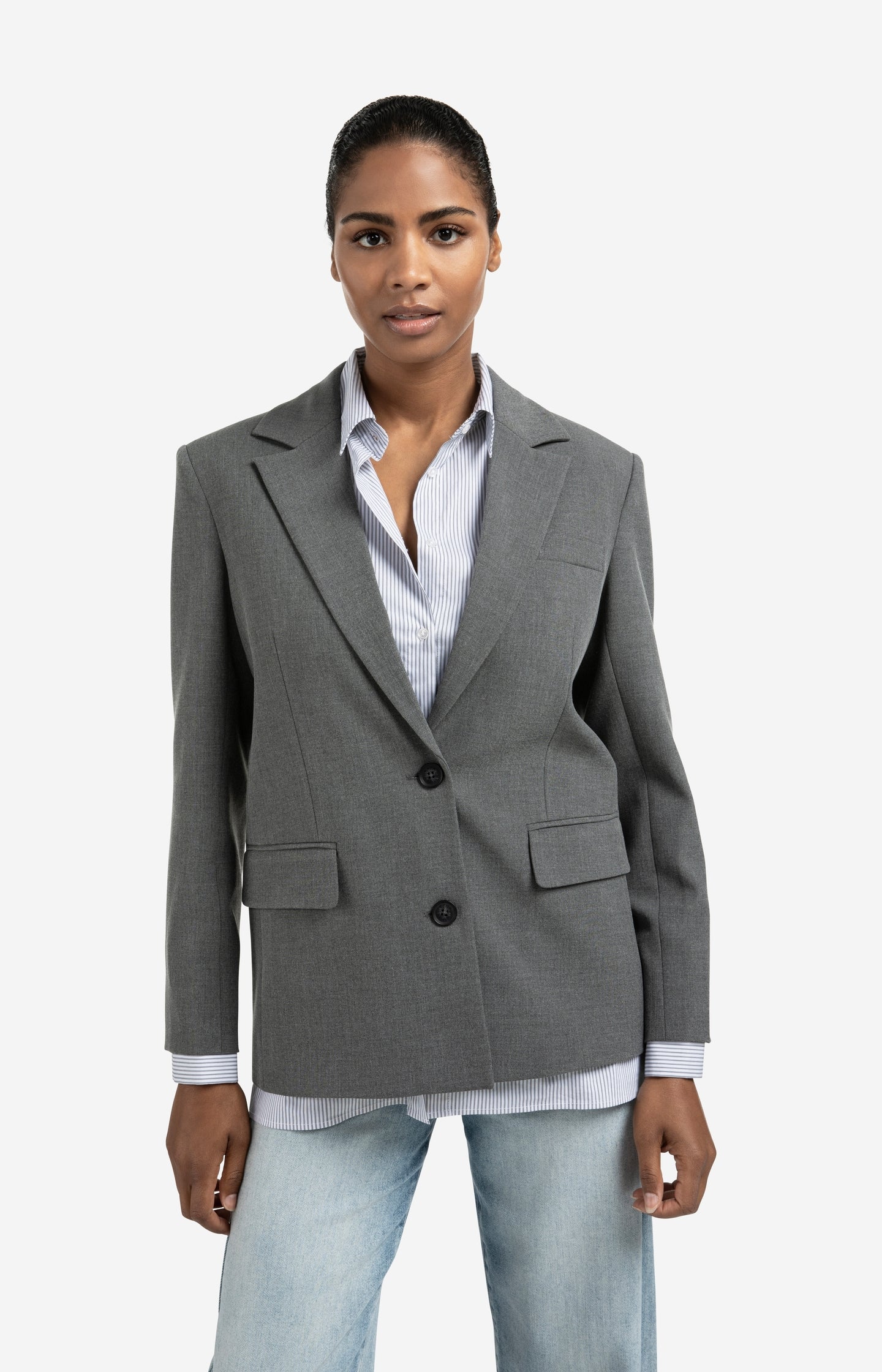 Blazer with sleeveless striped blouse