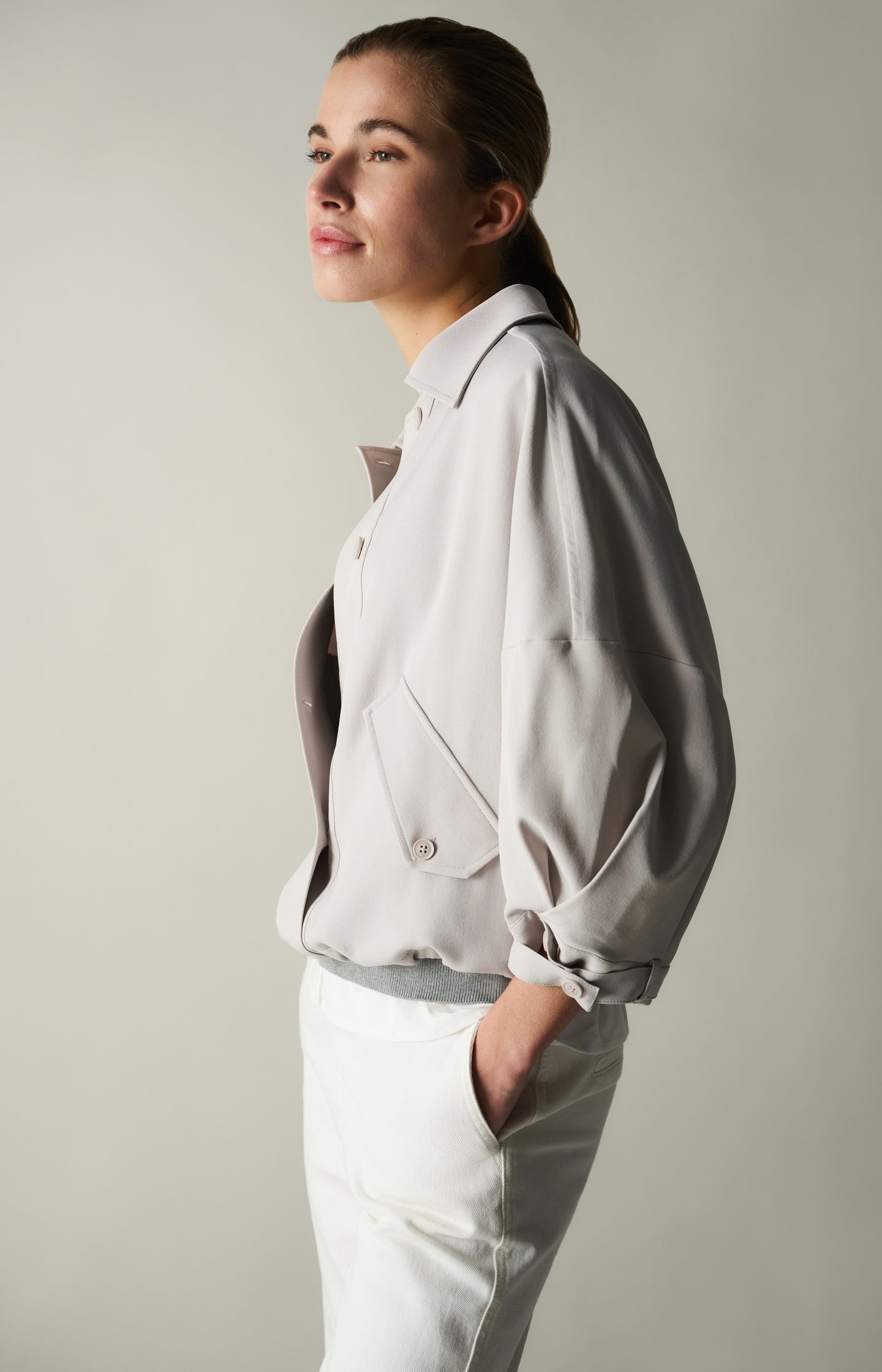 Blouse jacket with adjustable waistband and pockets
