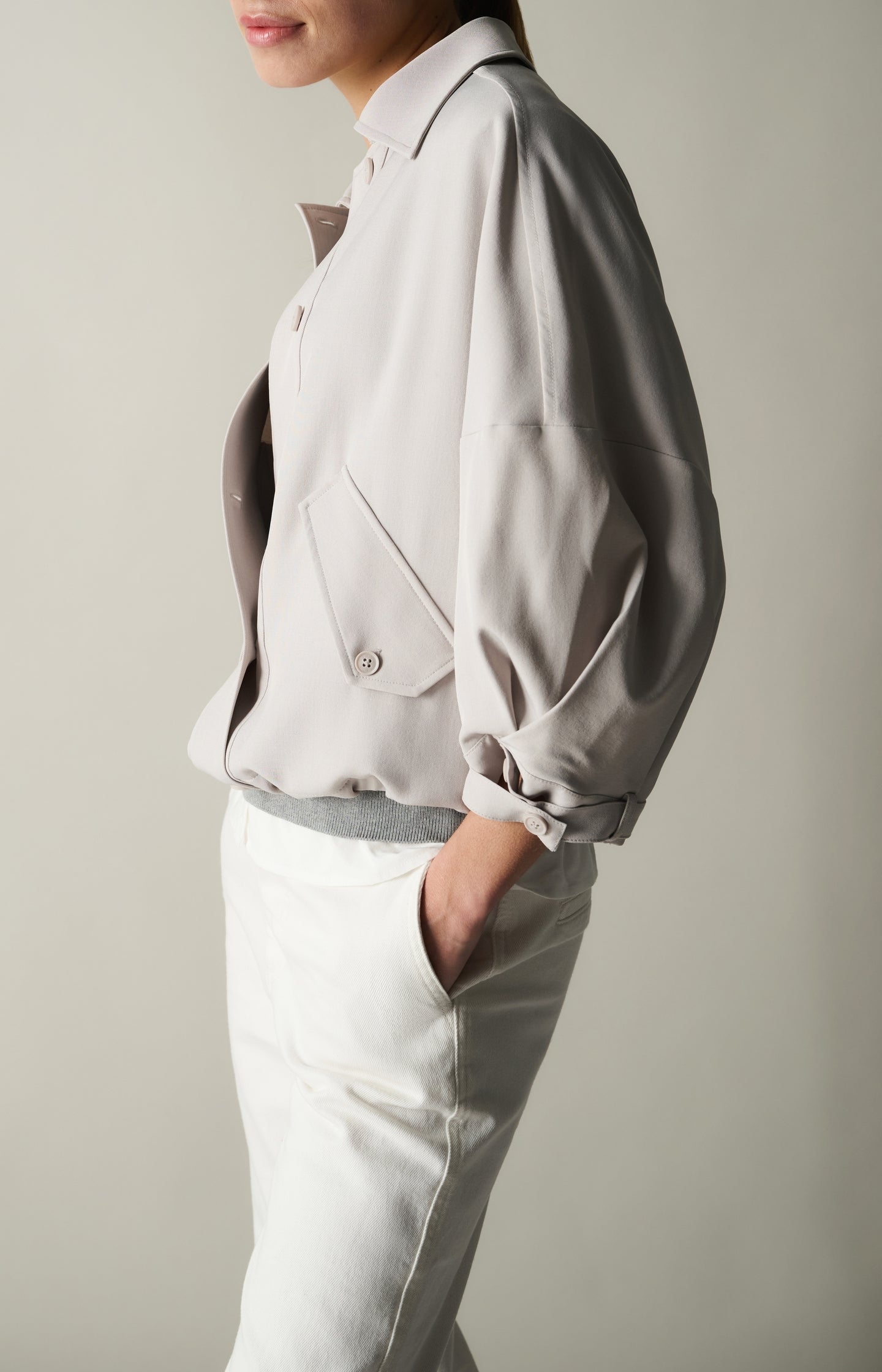 Blouse jacket with adjustable waistband and pockets