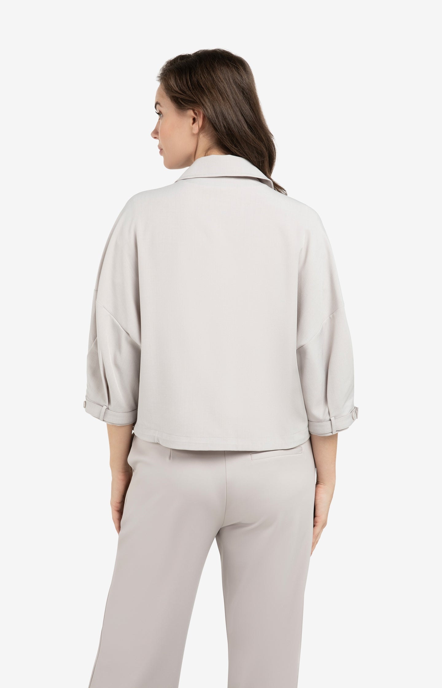 Blouse jacket with adjustable waistband and pockets