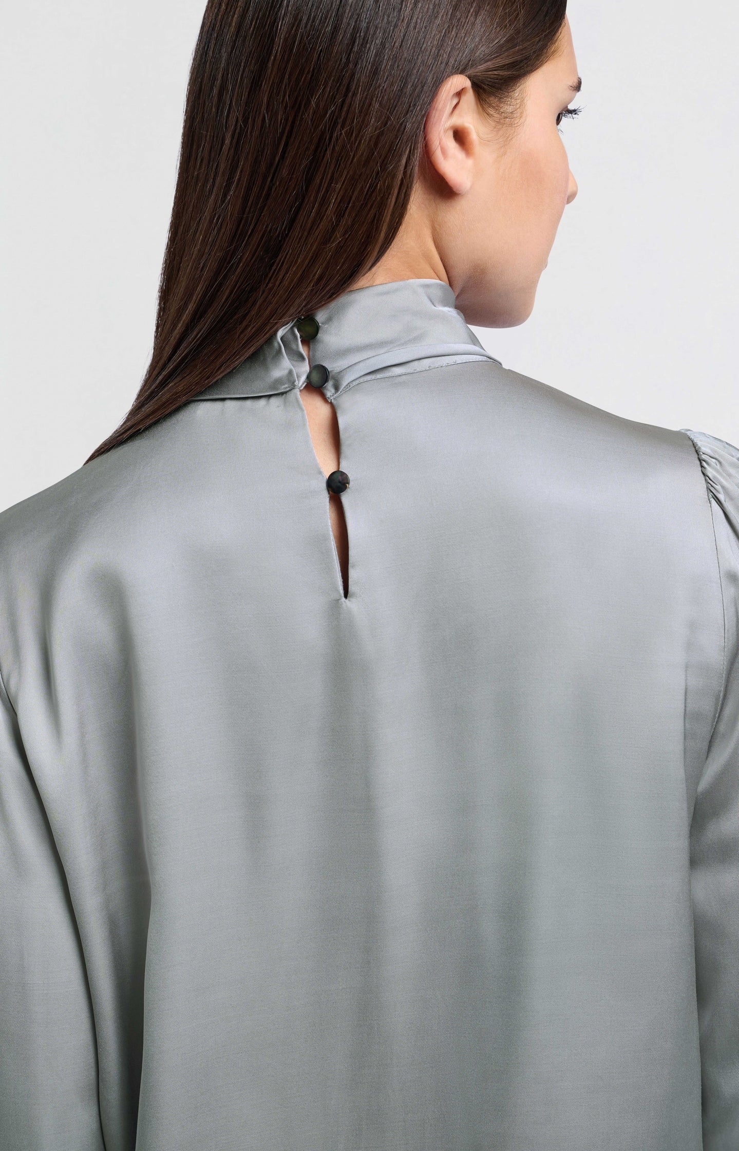 Blouse with pleats and turtleneck