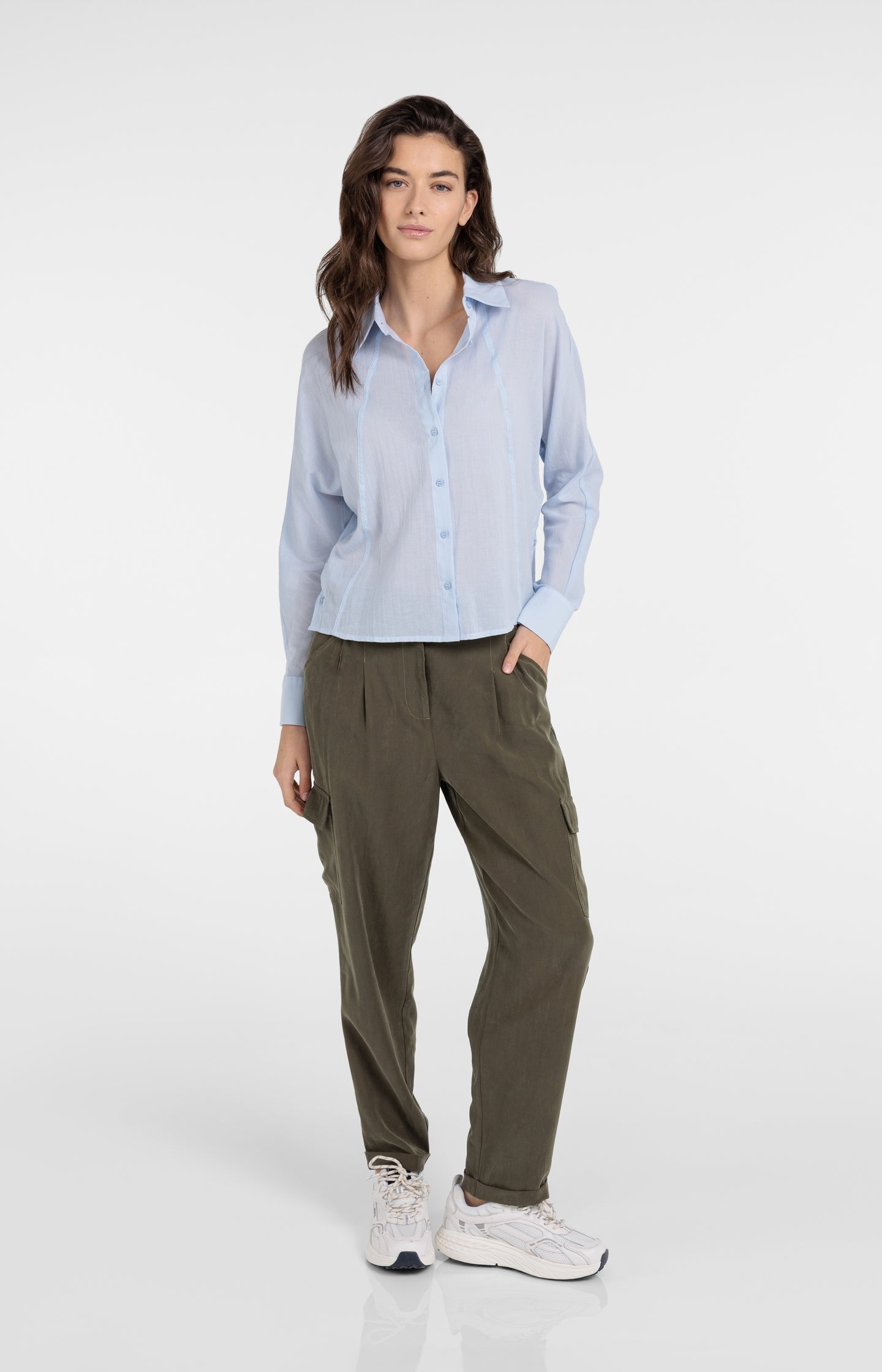 Blouse with angled seams and button details