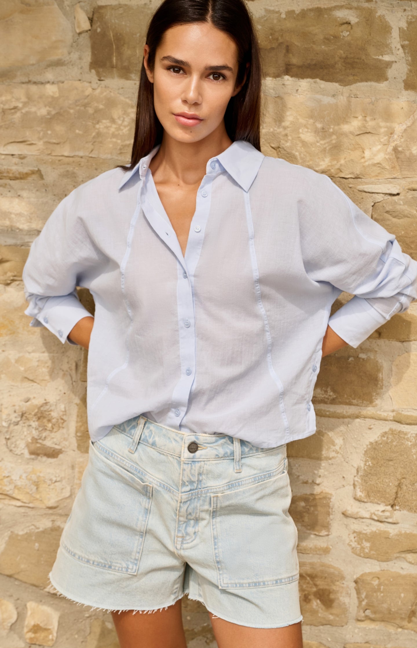 Blouse with angled seams and button details