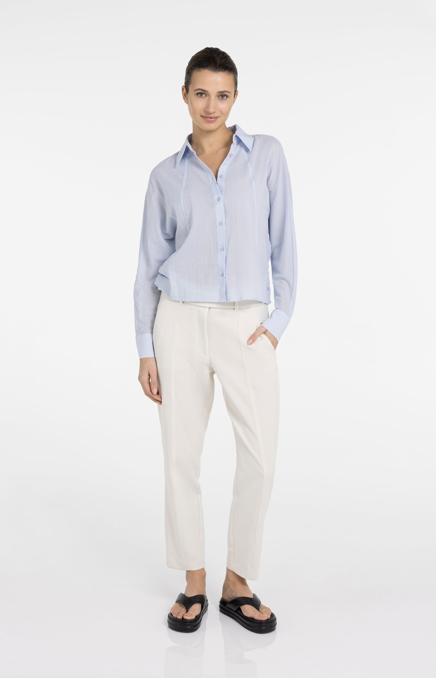 Blouse with angled seams and button details