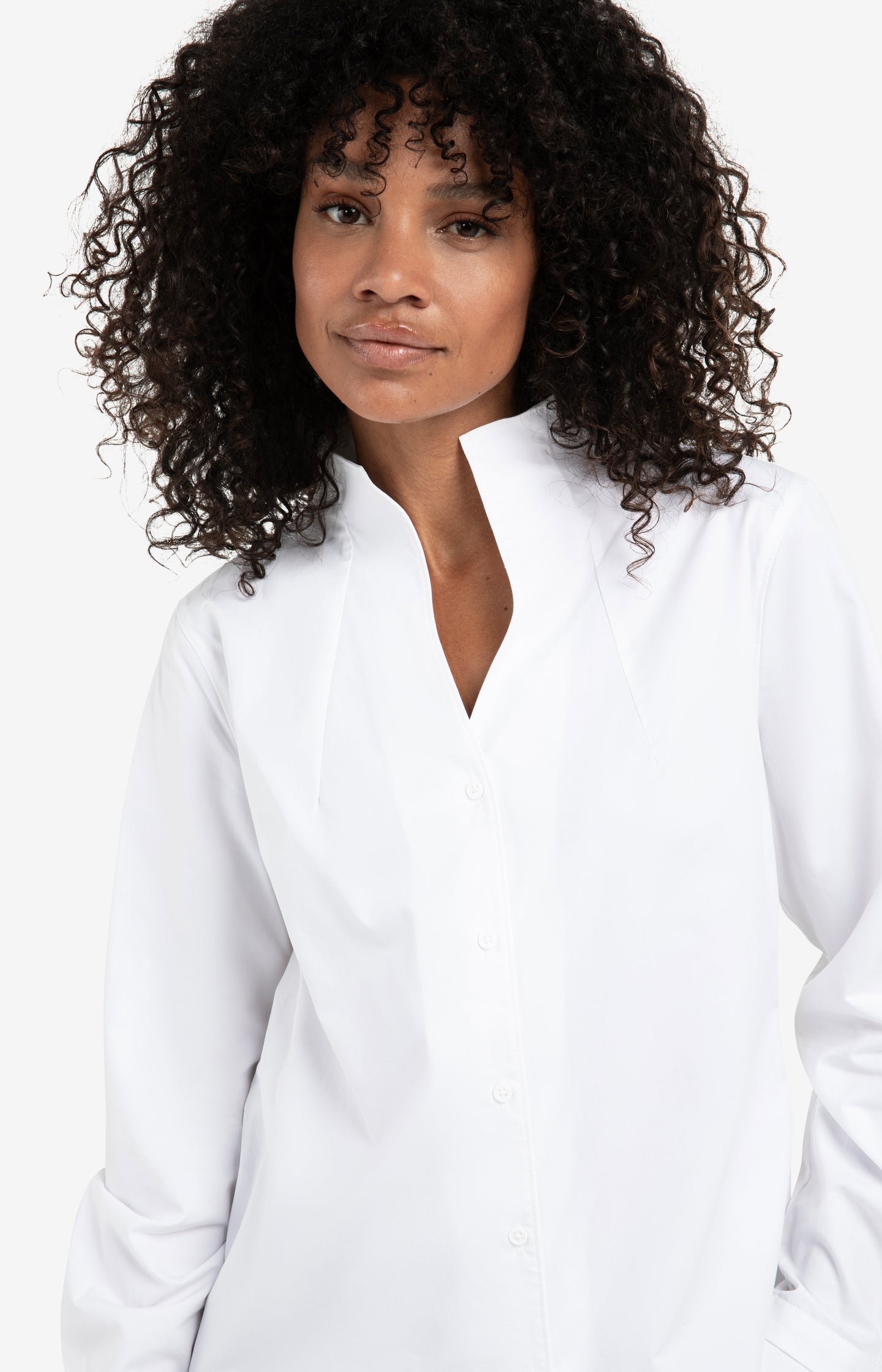 Blouse with high V-neck collar and cuffs