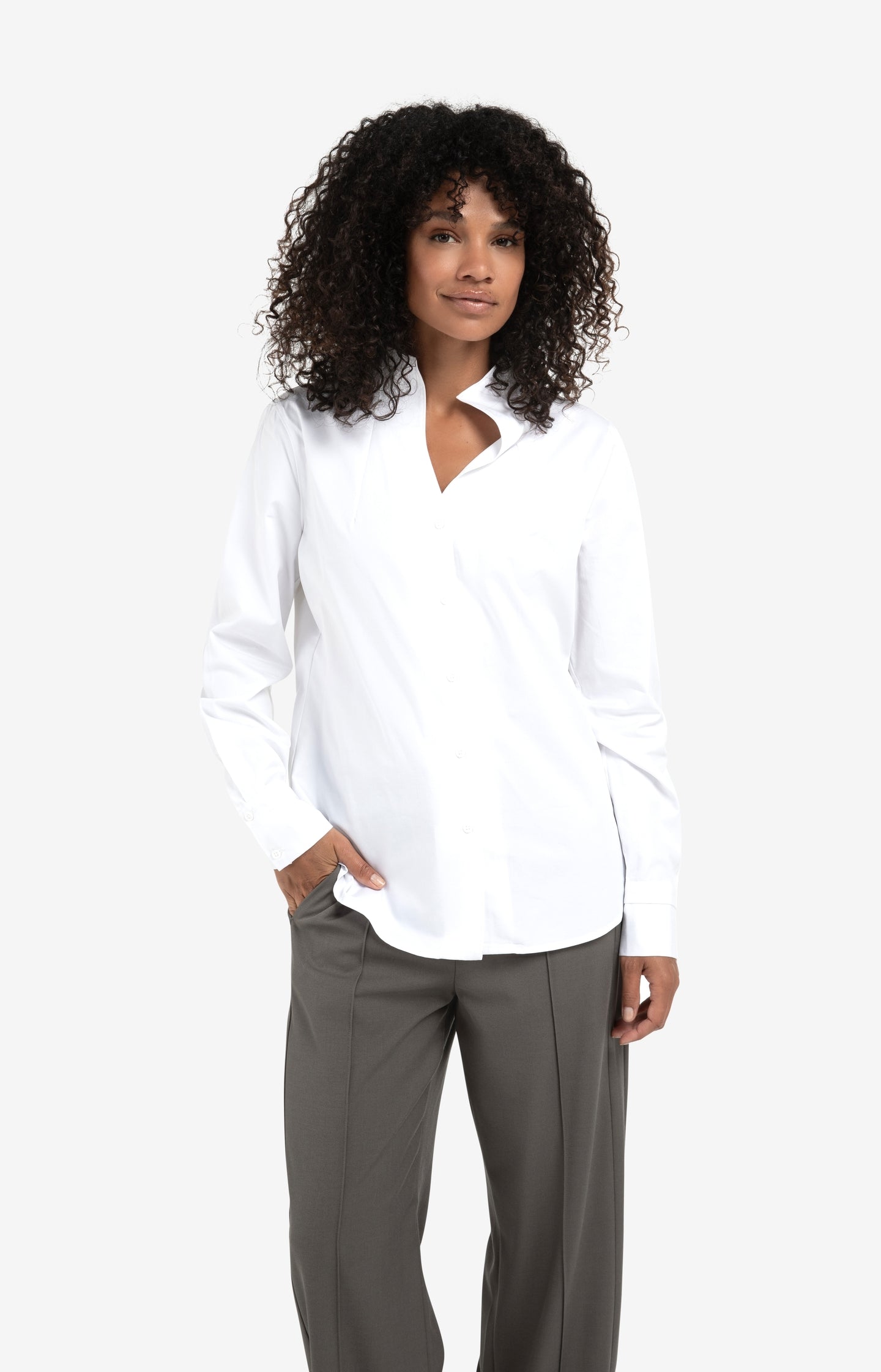 Blouse with high V-neck collar and cuffs