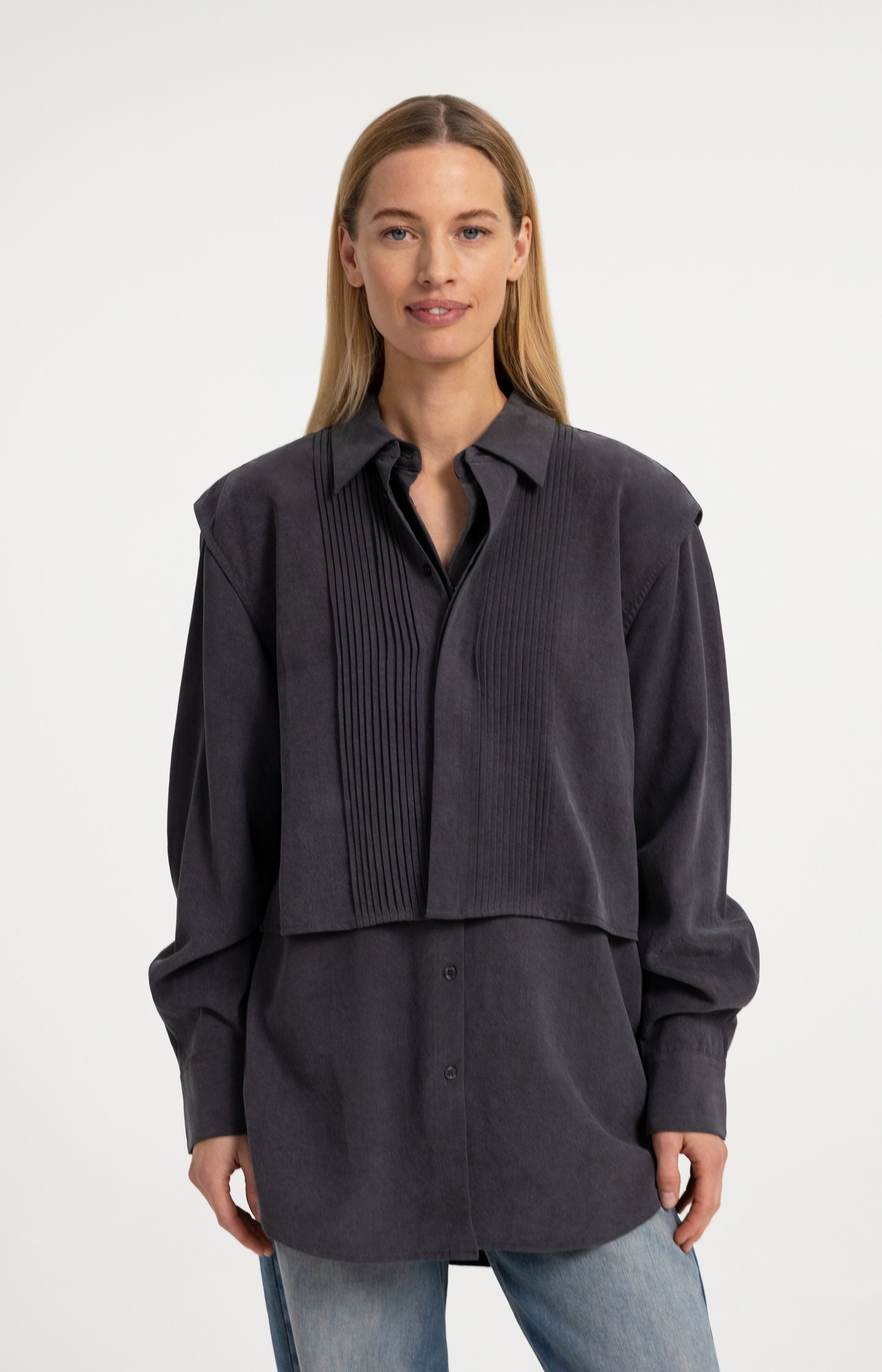 Blouse with layered gilet and pleated details