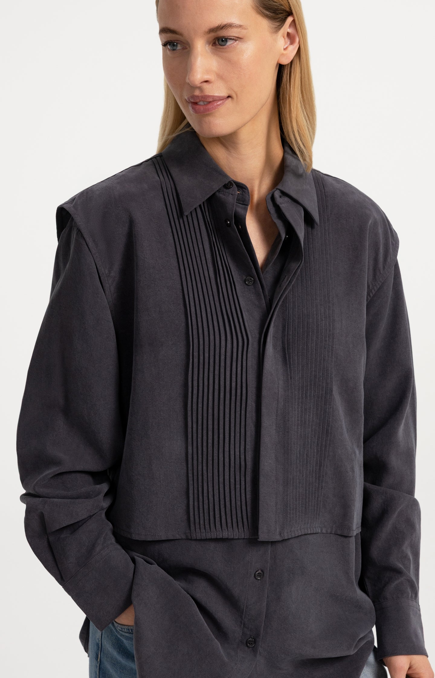 Blouse with layered gilet and pleated details
