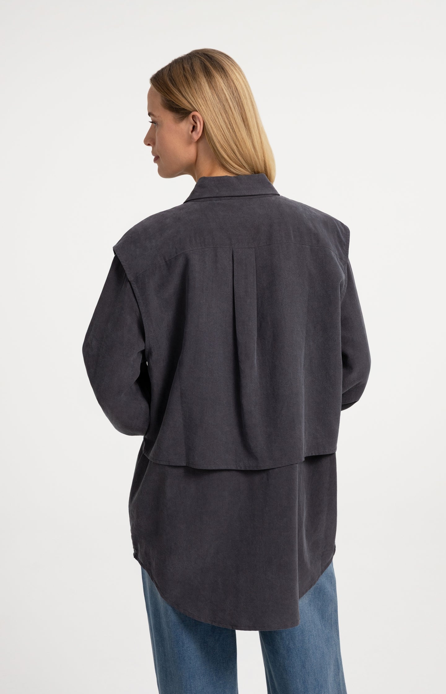 Blouse with layered gilet and pleated details