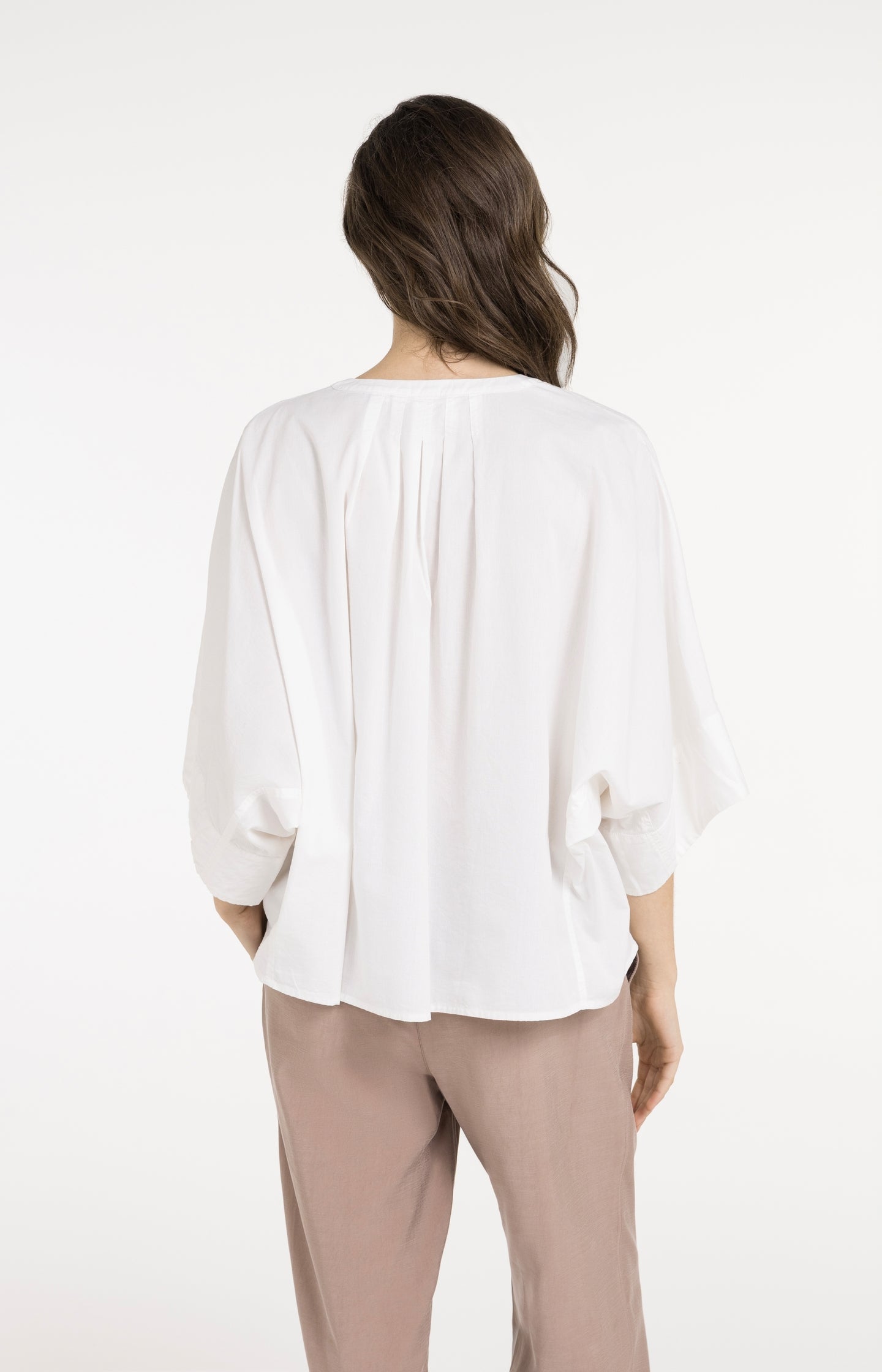 Blouse with short batwing sleeves and pleat details