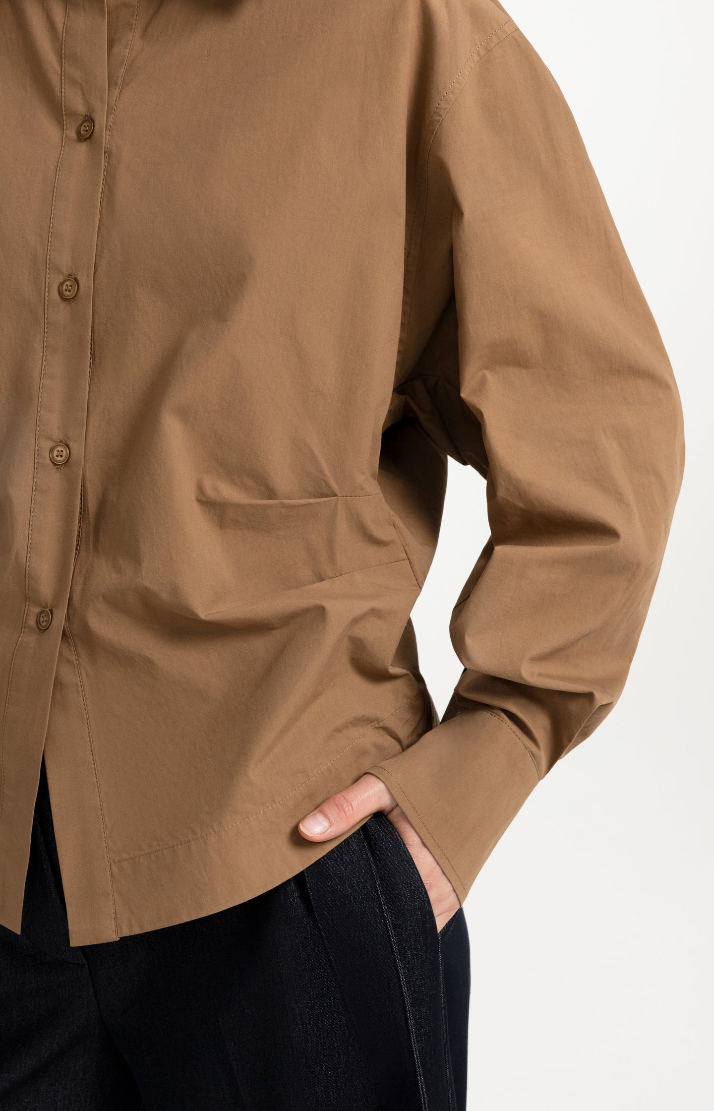 Blouse with waist accent and pleat detail