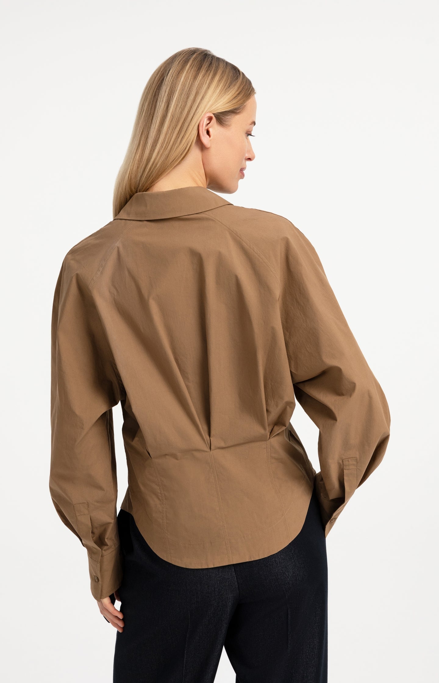 Blouse with waist accent and pleat detail