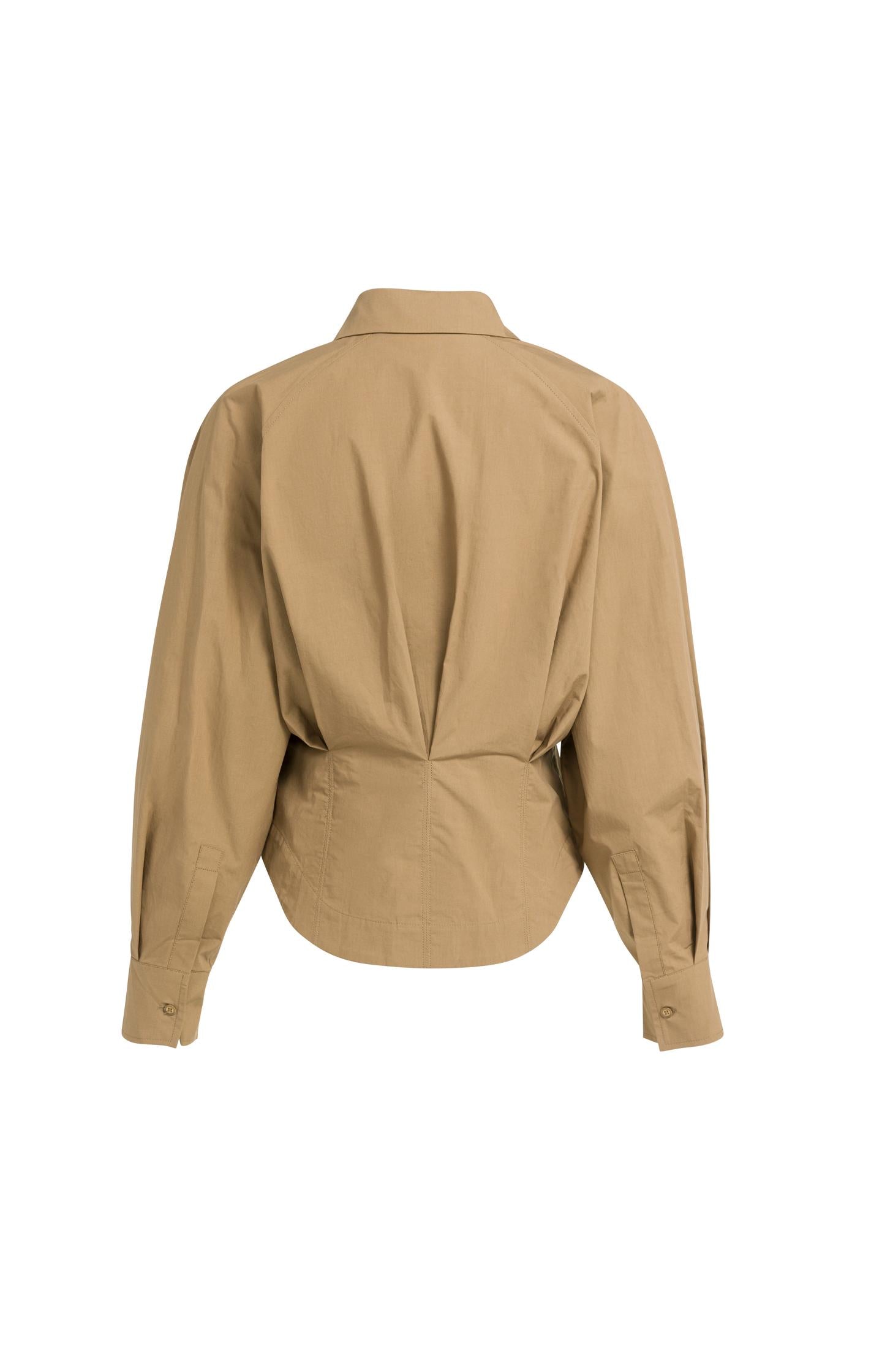 Blouse with waist accent and pleat detail