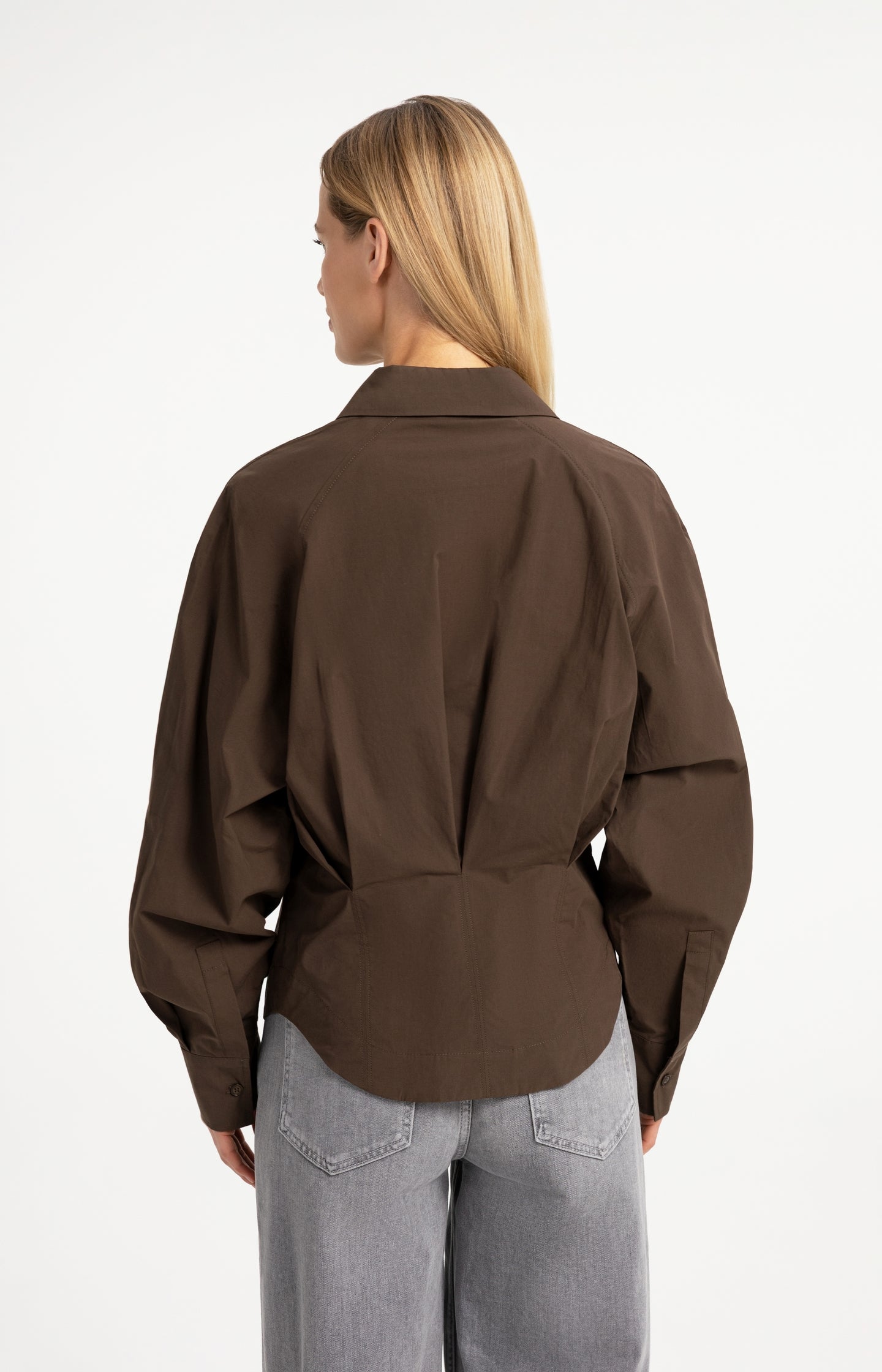 Blouse with waist accent and pleat detail